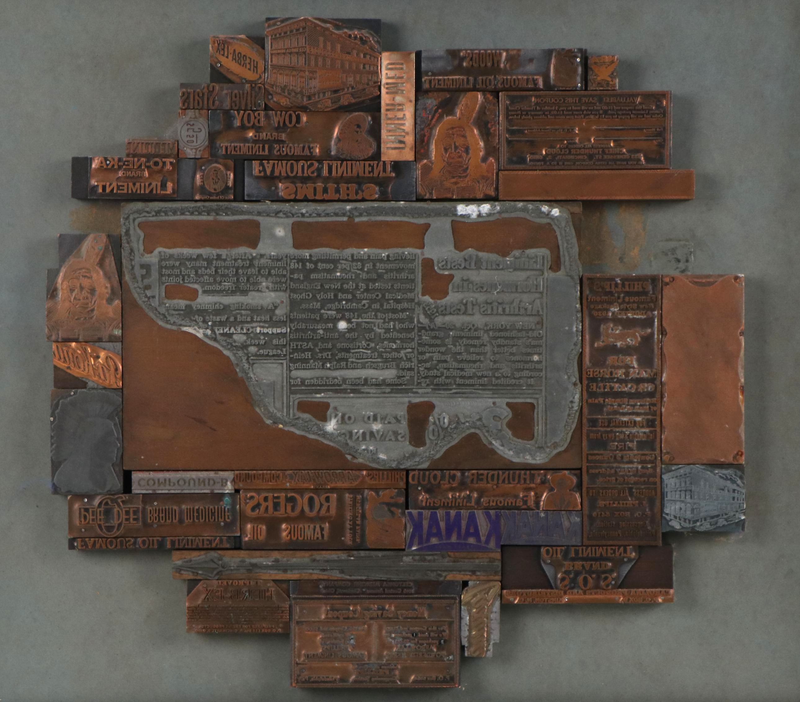 Assemblage of Wood and Metal Newspaper Printing Blocks