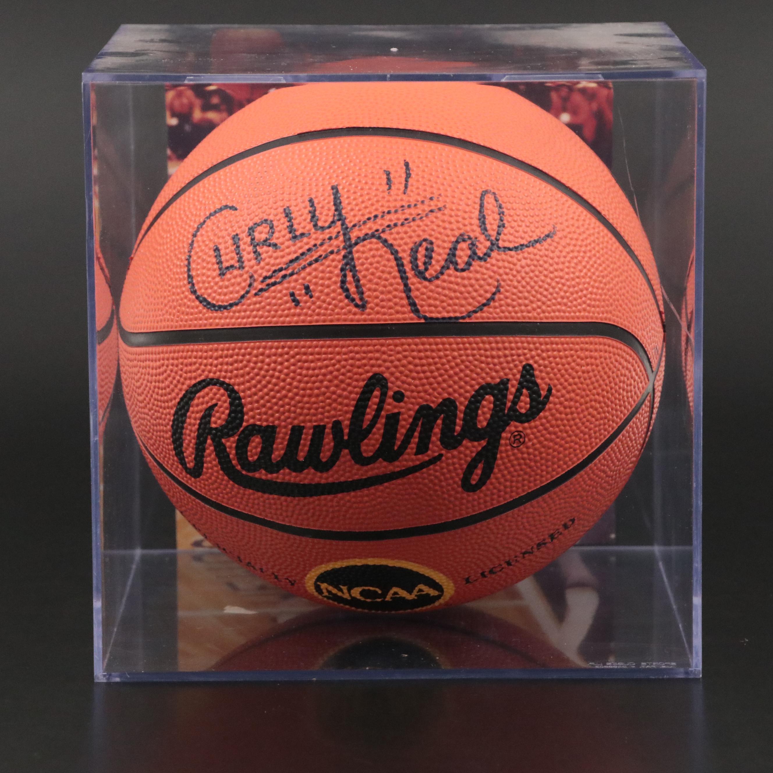 Curley Neal Signed Rawlings Basketball in Harlem Globetrotters Display