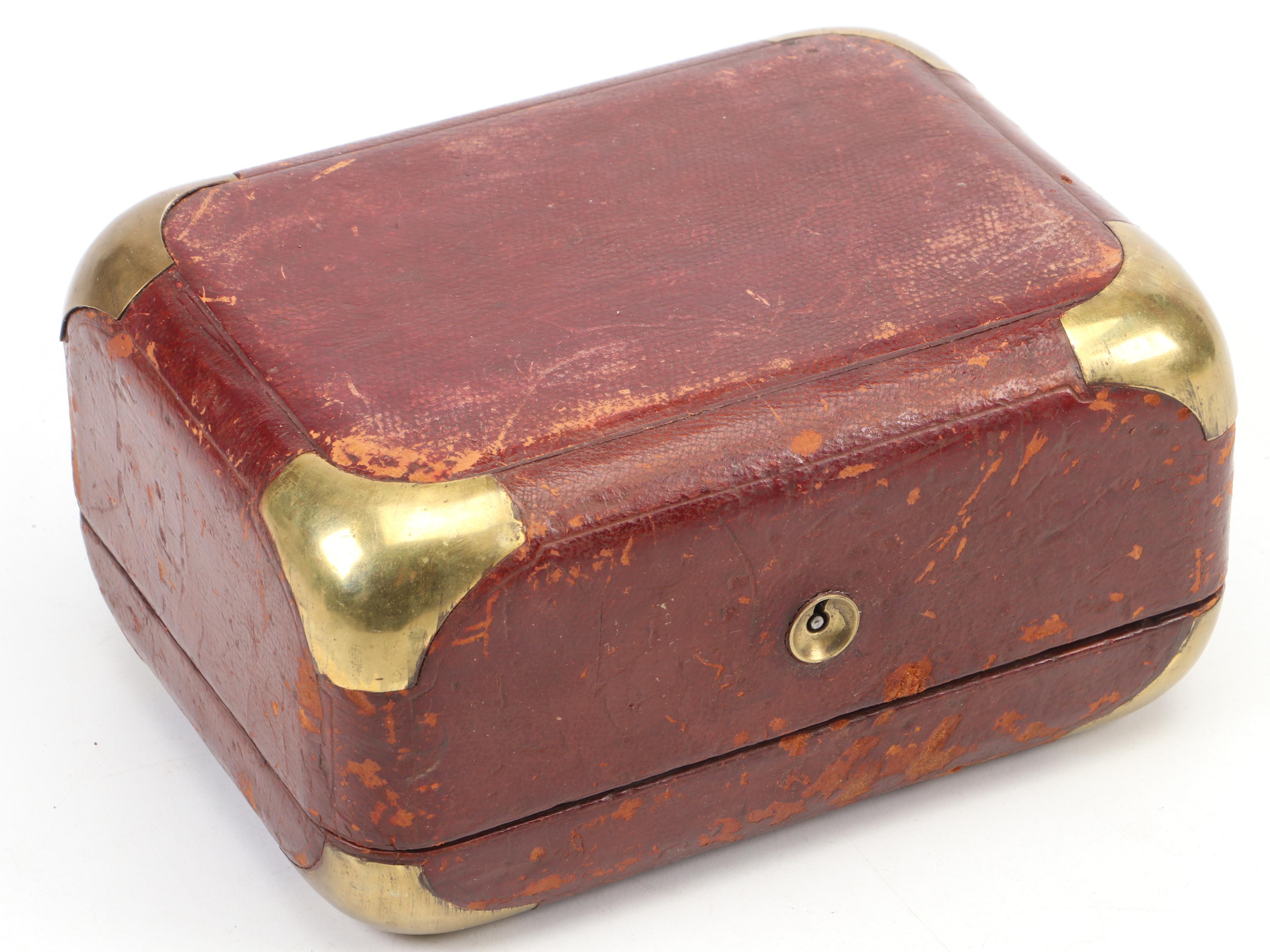 European Leather Covered Jewelry Box with Corner Covers and Handle, Late 19th C.