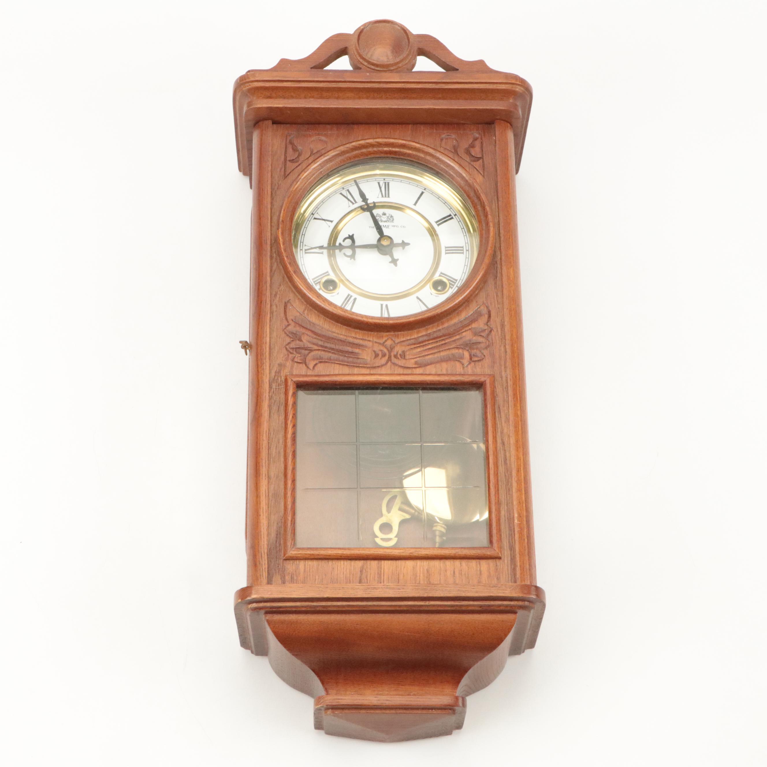 The Time Mfg. Co. Wood and Brass Centennial Parlor Clock