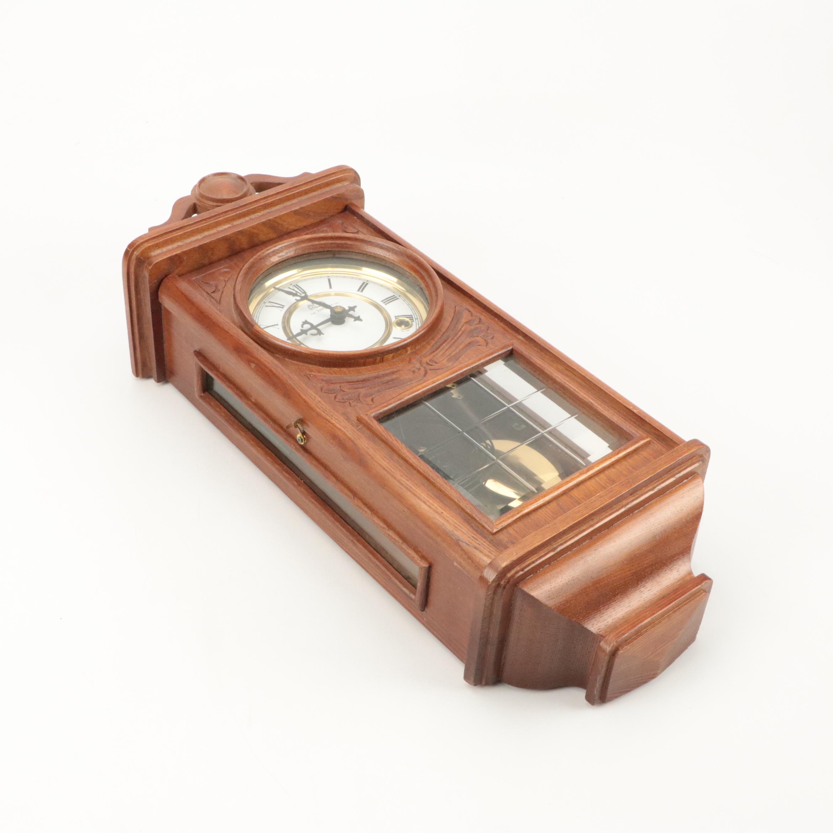 The Time Mfg. Co. Wood and Brass Centennial Parlor Clock