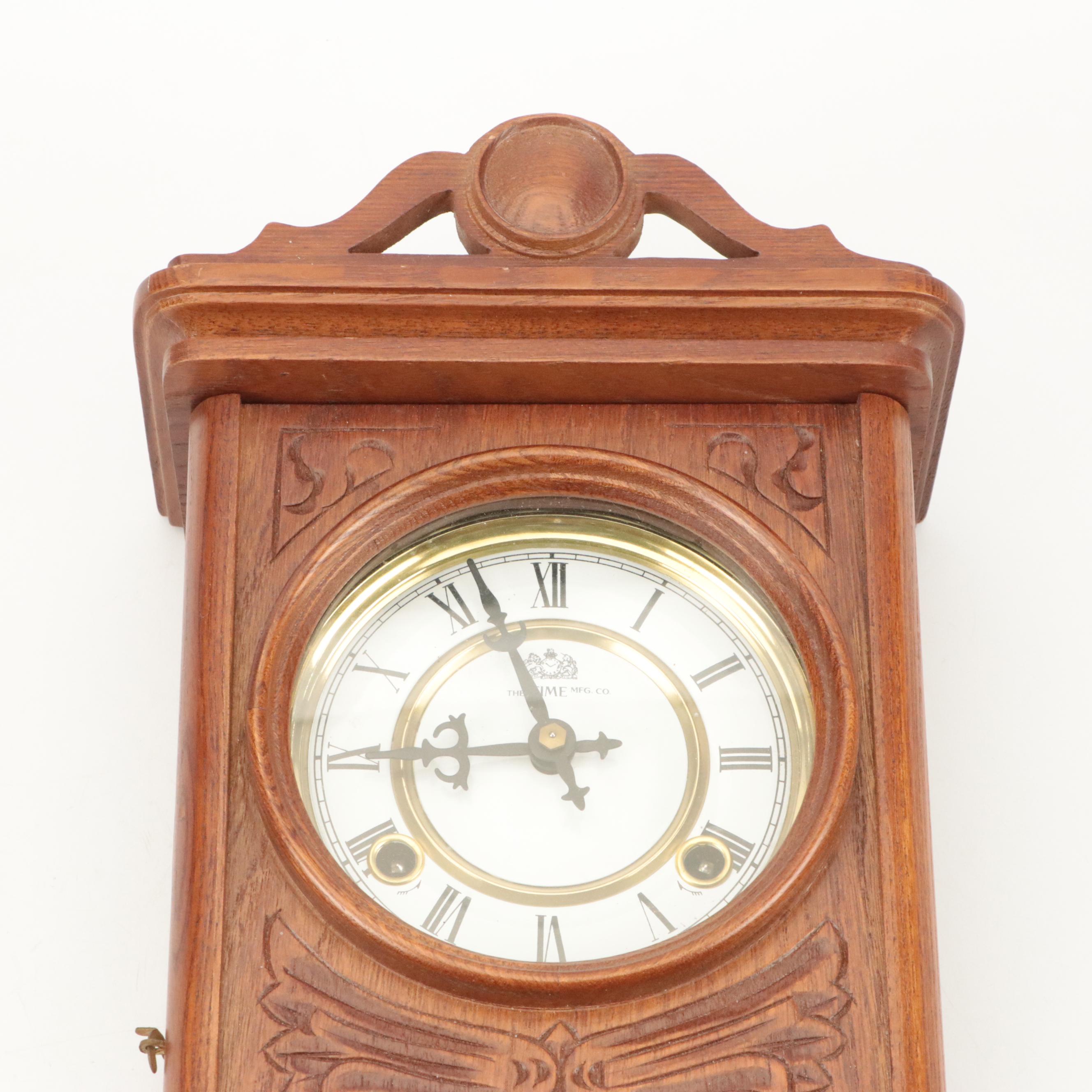 The Time Mfg. Co. Wood and Brass Centennial Parlor Clock