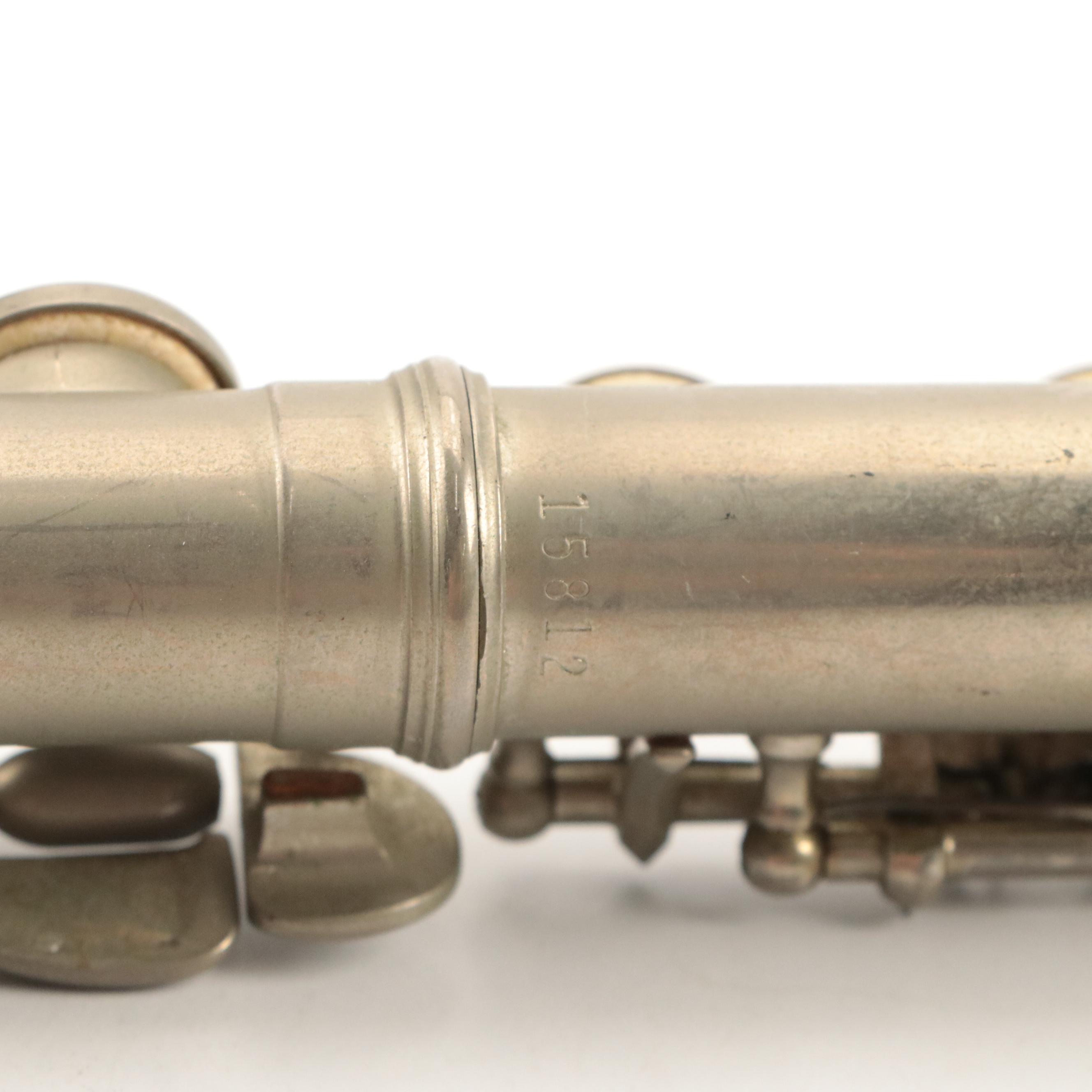 Conn Rosewood Clarinet with Selmer Metal Flute