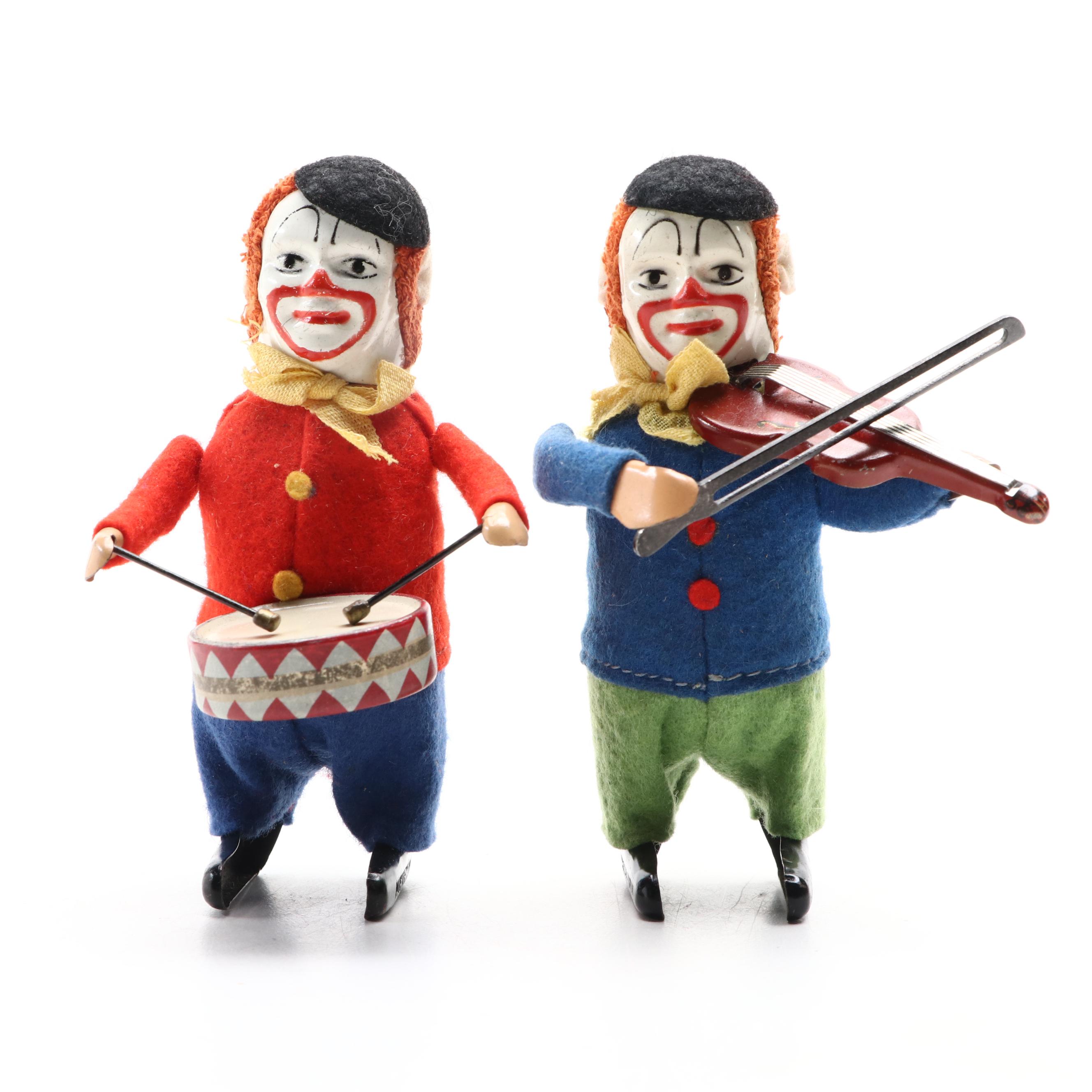 Schuco Wind-Up Instrument Playing Clown Toys, Mid-20th Century