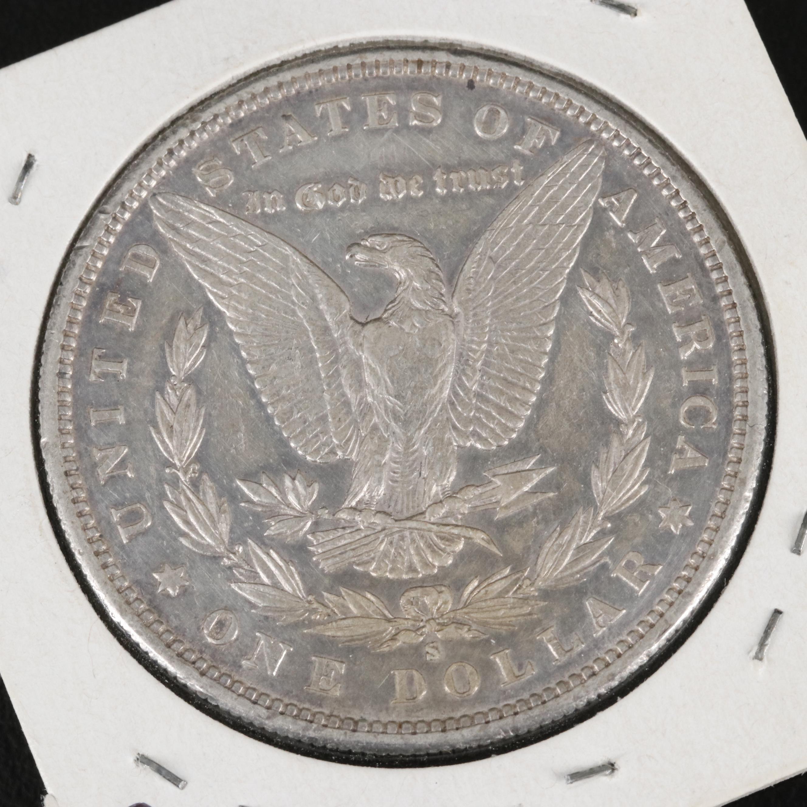 Four Different Morgan Dollars With an 1878 8 Feathers