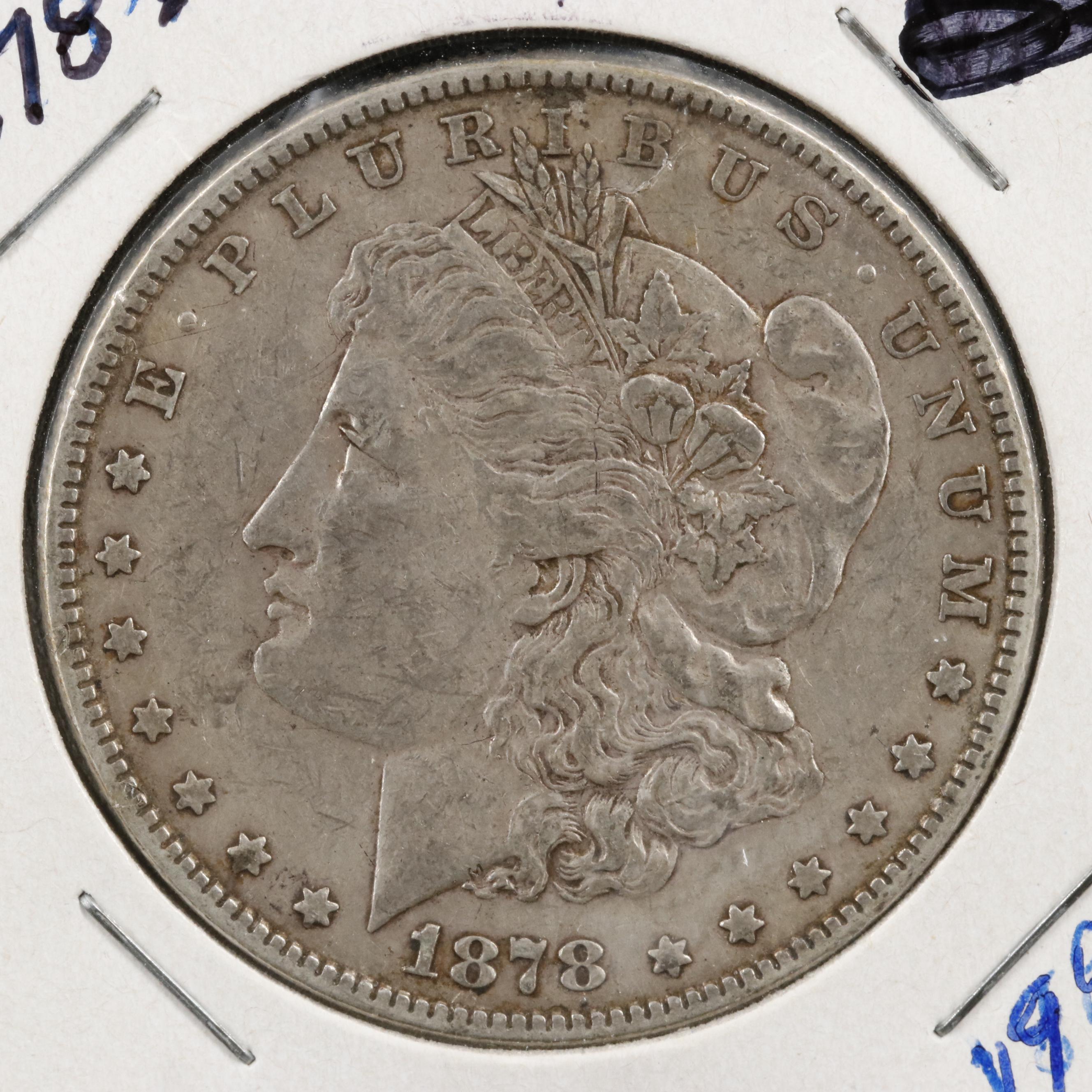 Four Different Morgan Dollars With an 1878 8 Feathers