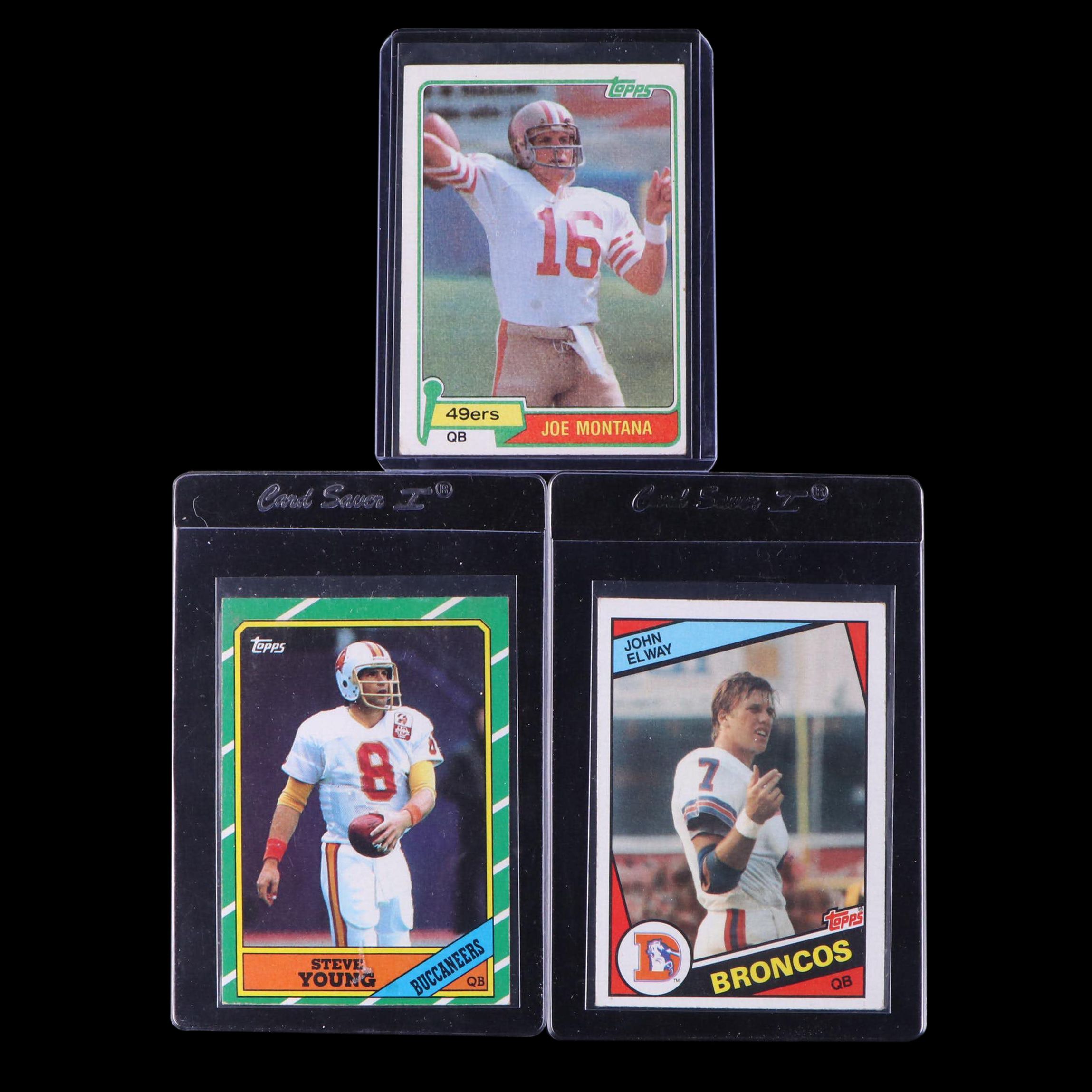 Joe Montana, Steve Young, and John Elway Topps Rookie Cards