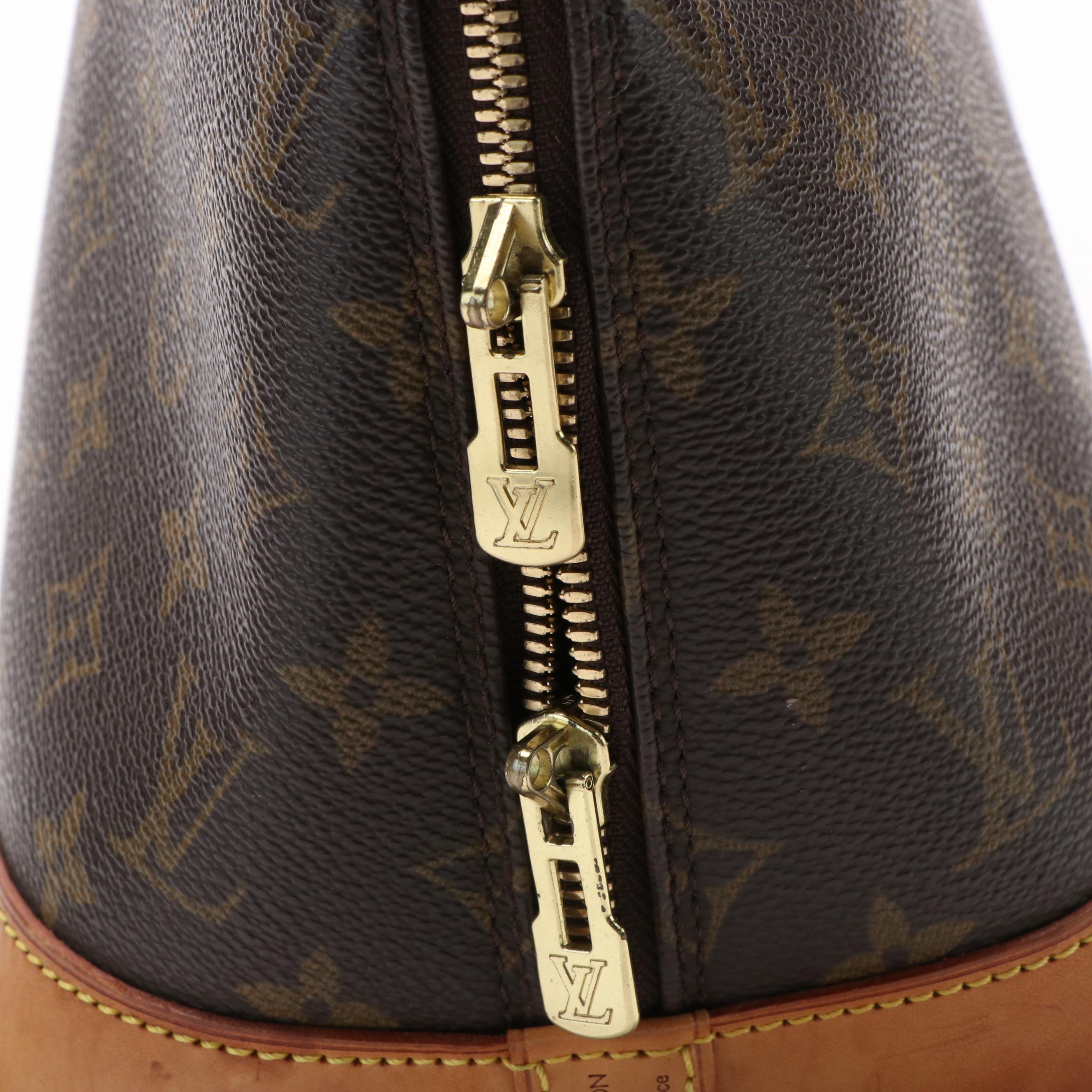 Louis Vuitton Alma Monogram Canvas Handled Bag