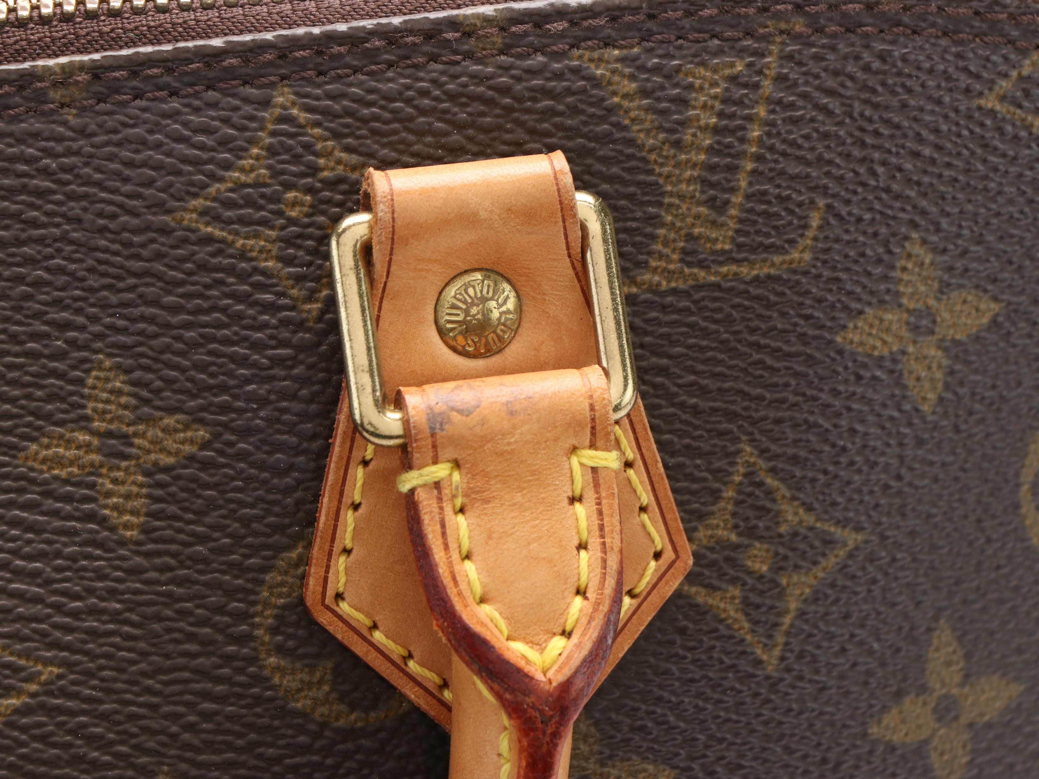 Louis Vuitton Alma Monogram Canvas Handled Bag