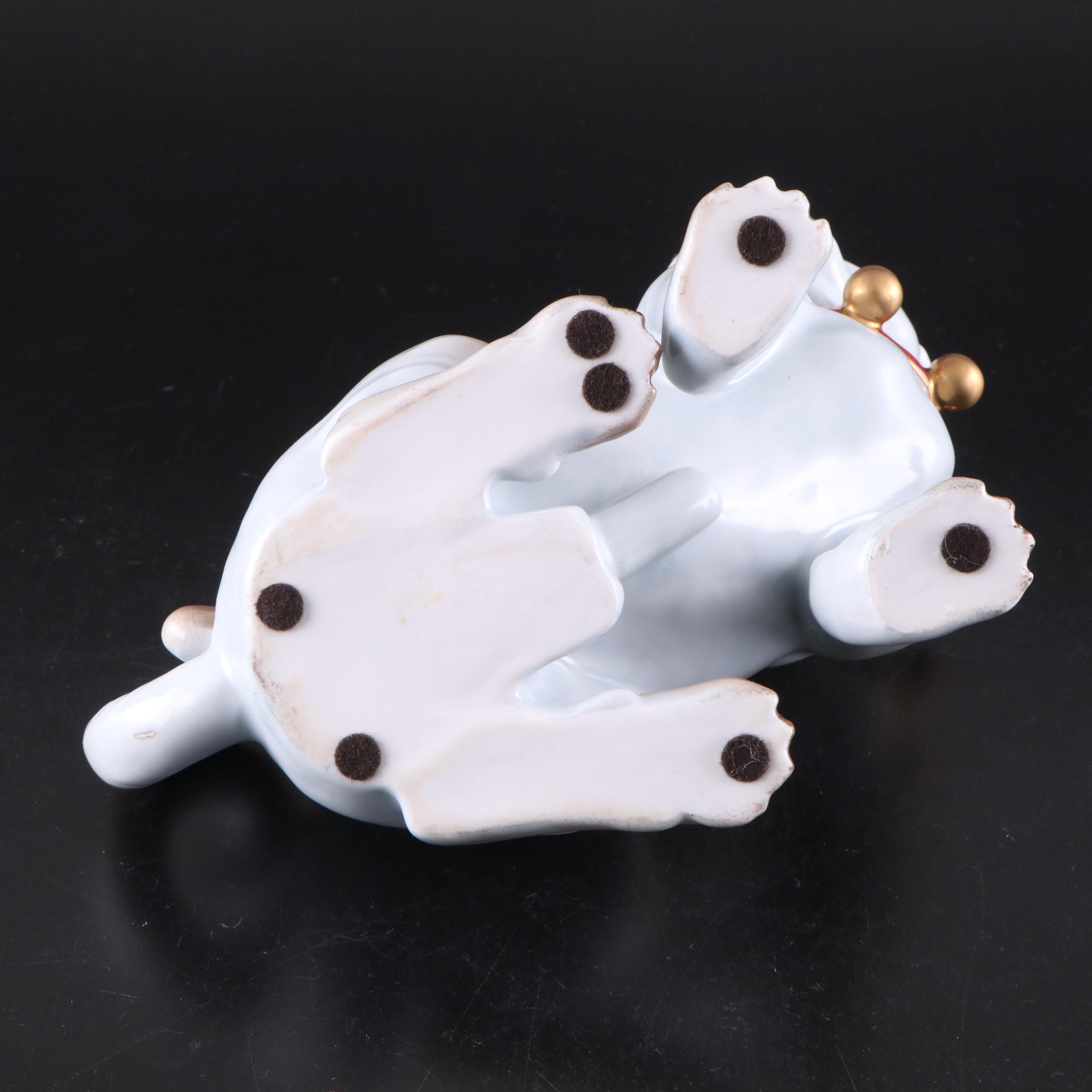 Pair of Dresden Style Porcelain Pug Figurines