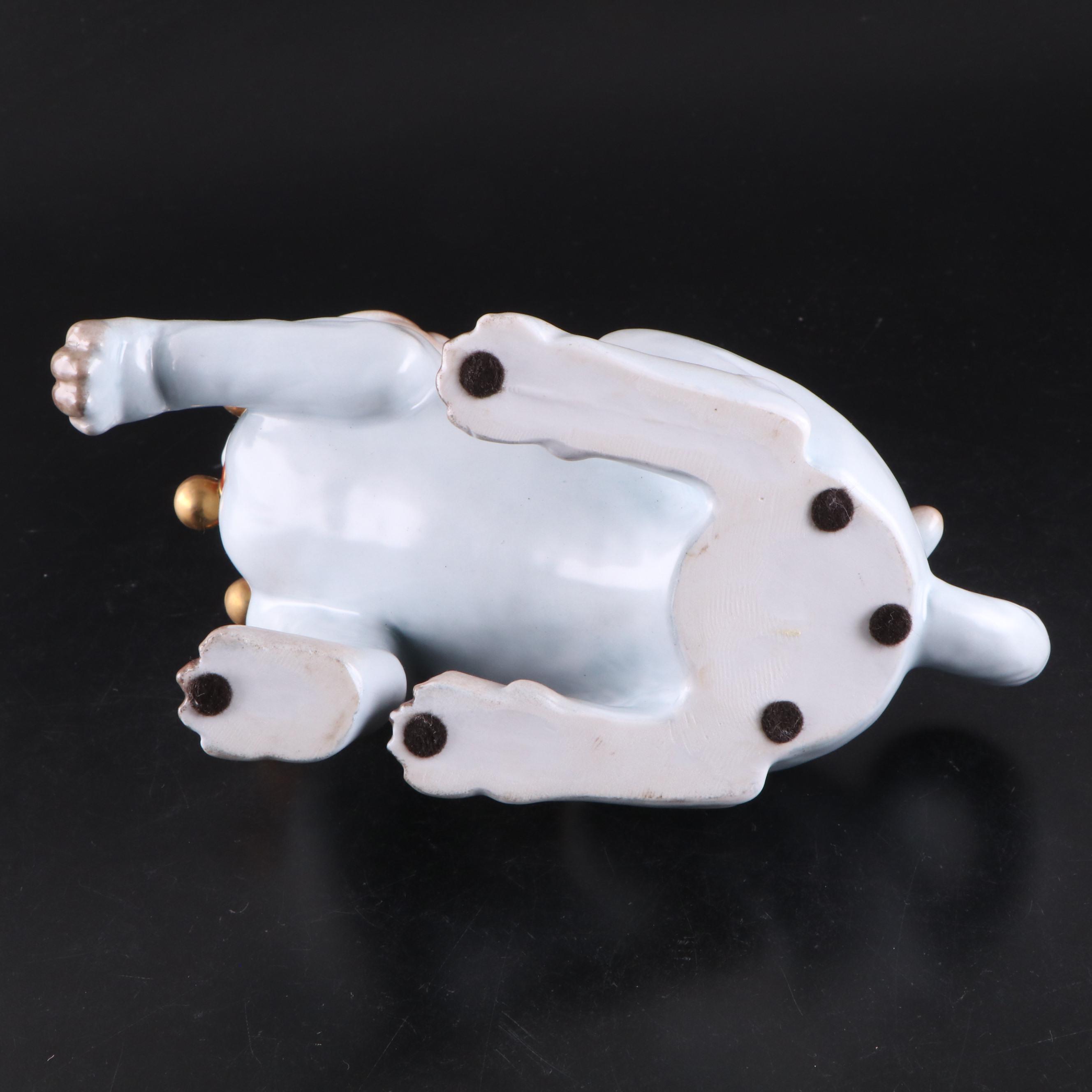 Pair of Dresden Style Porcelain Pug Figurines