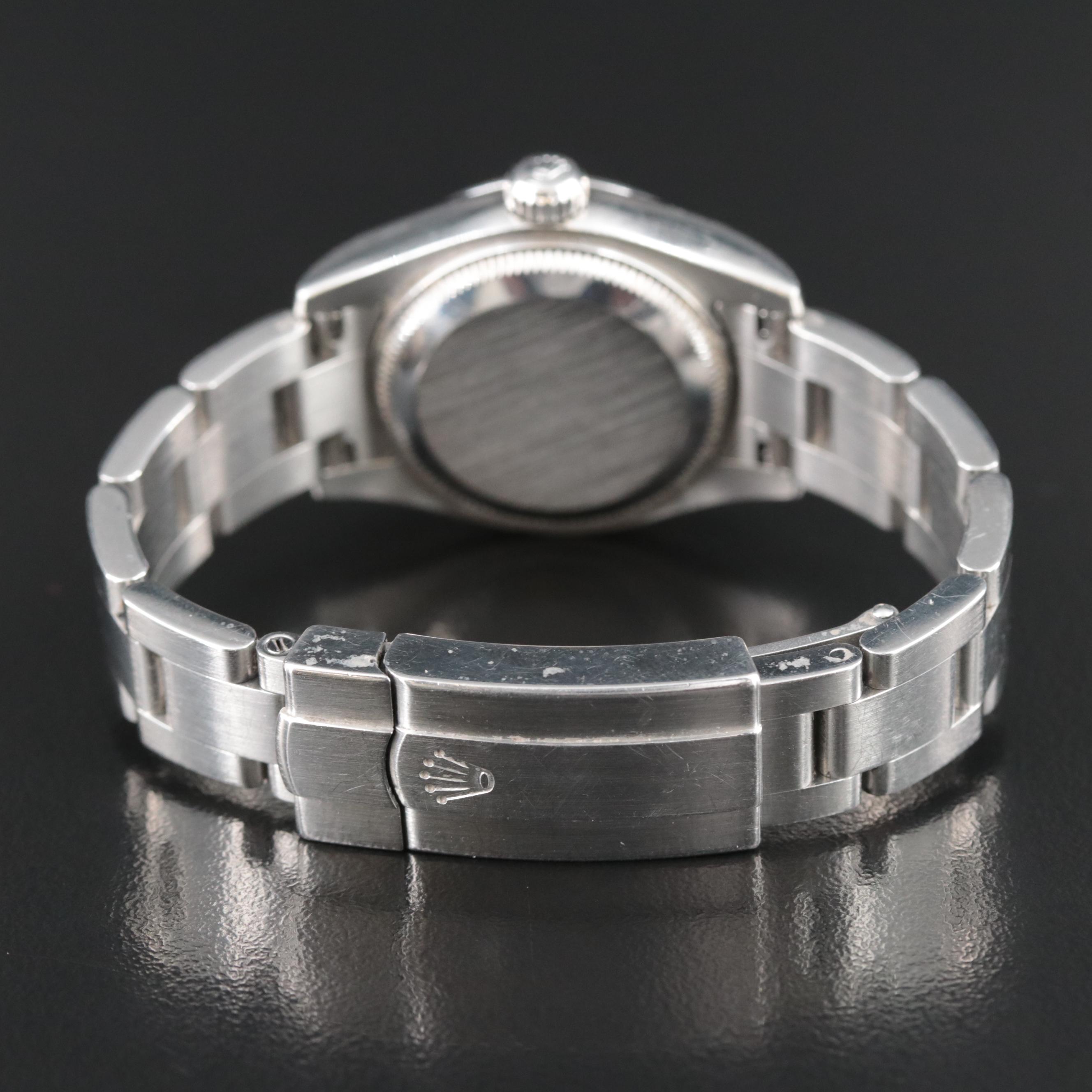 Rolex Oyster Perpetual White Arabic Dial Watch