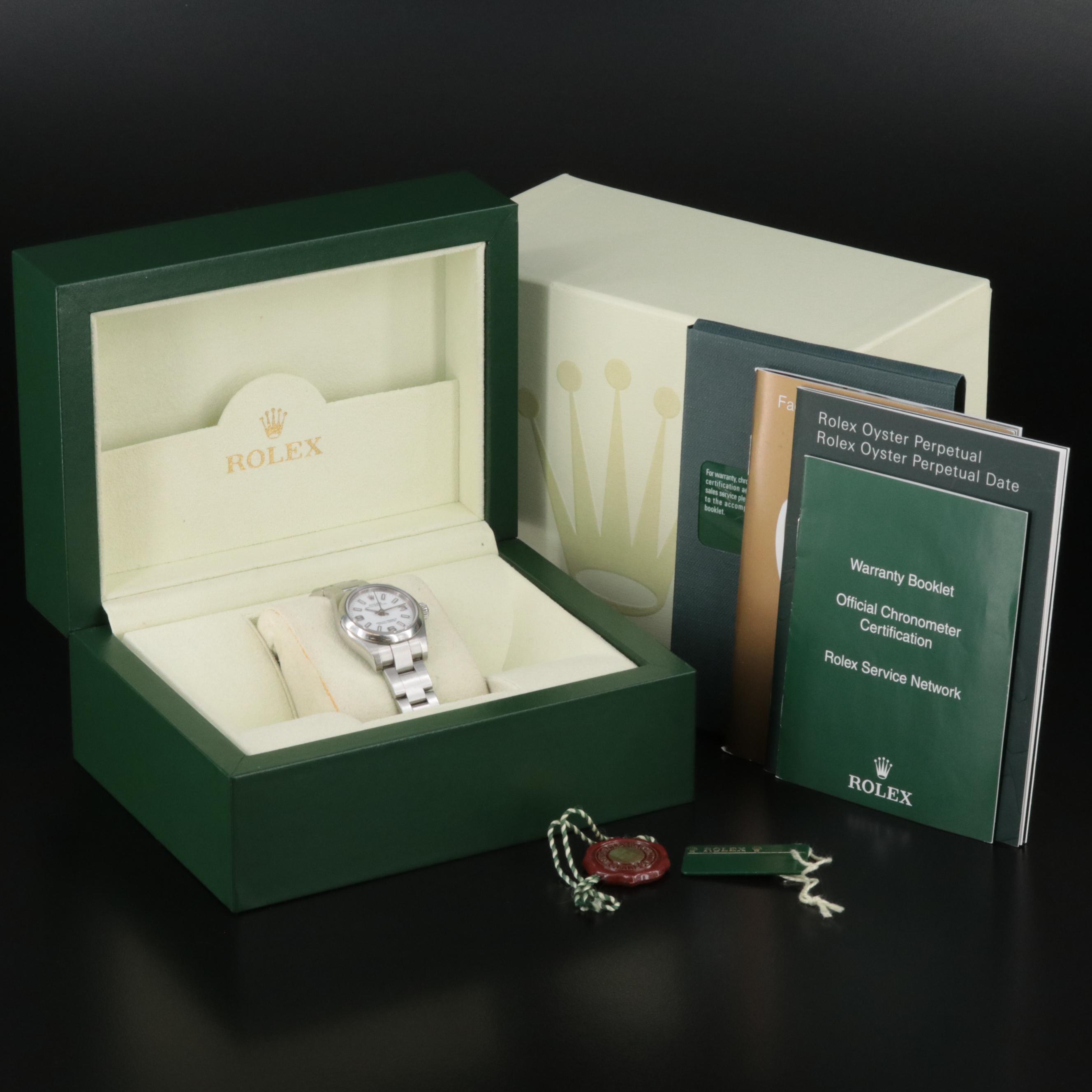 Rolex Oyster Perpetual White Arabic Dial Watch