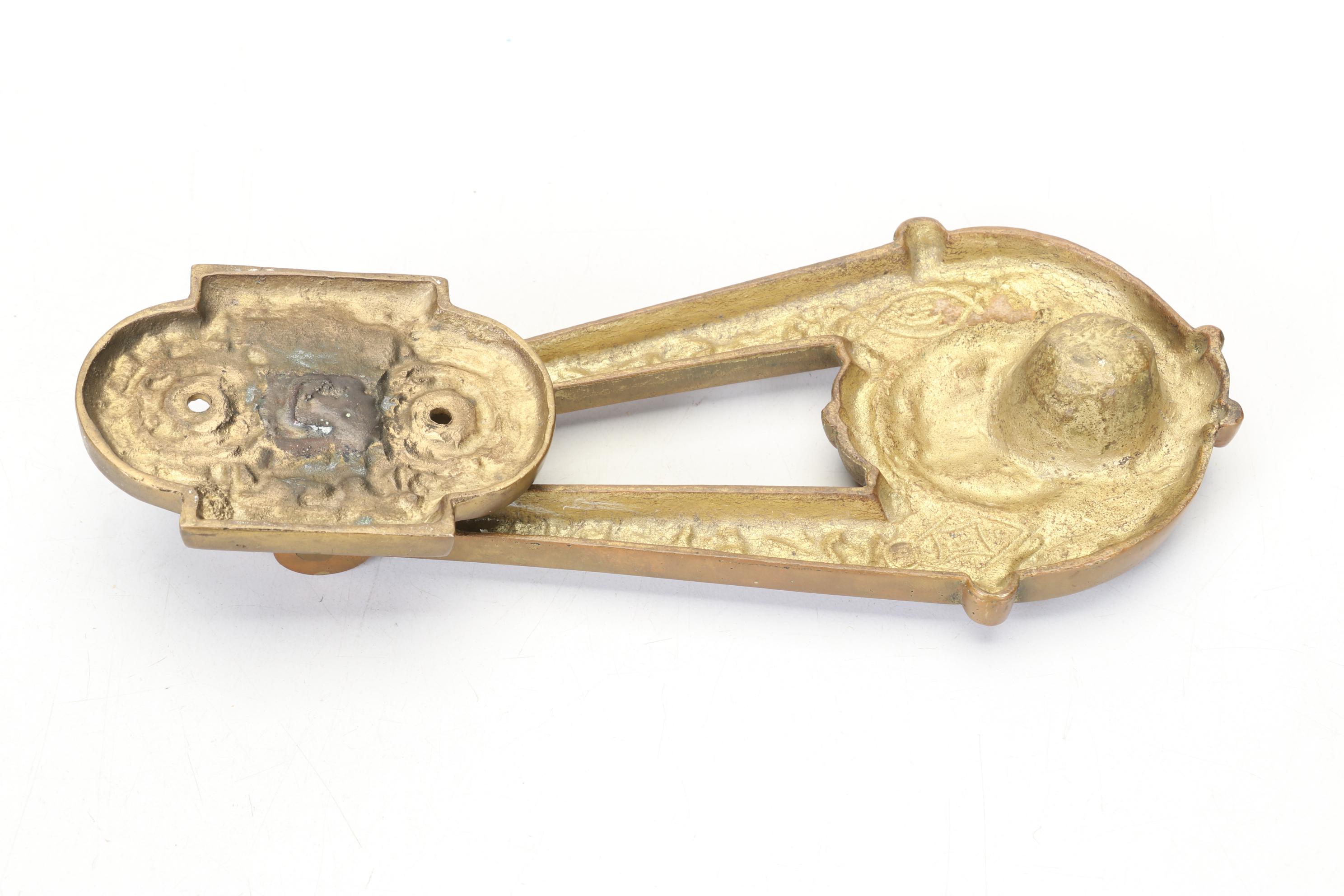 Brass "Spirit of the North Wind" Door Knocker and Strike Plate