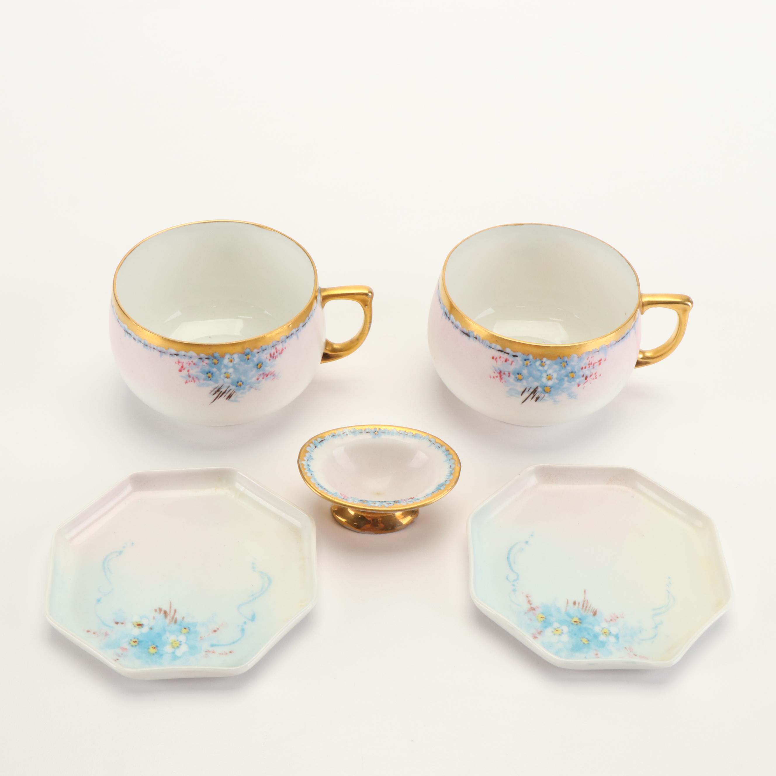 Bavarian Hand-Painted Blue Floral Gilt Porcelain Dinnerware, Early 20th C.