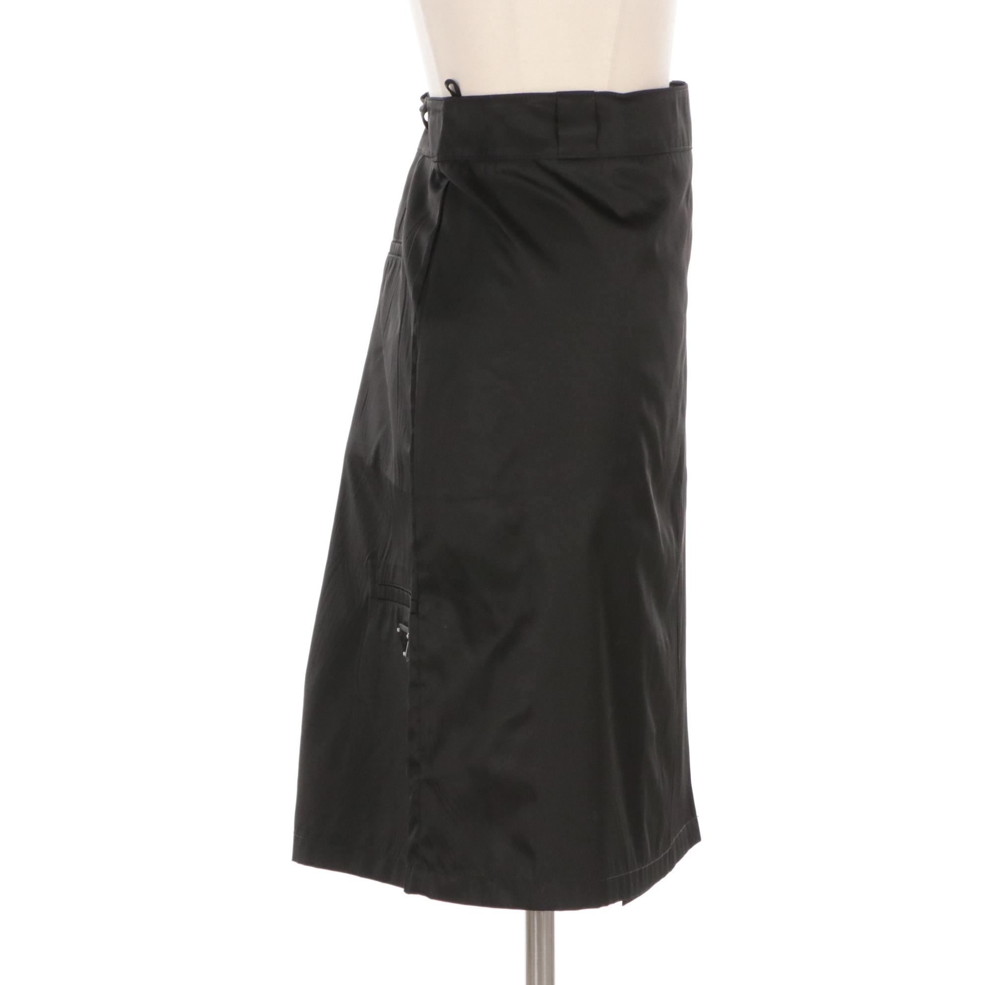 Prada Knee-Length Skirt in Black Polyamide with Enameled Logo Plaque