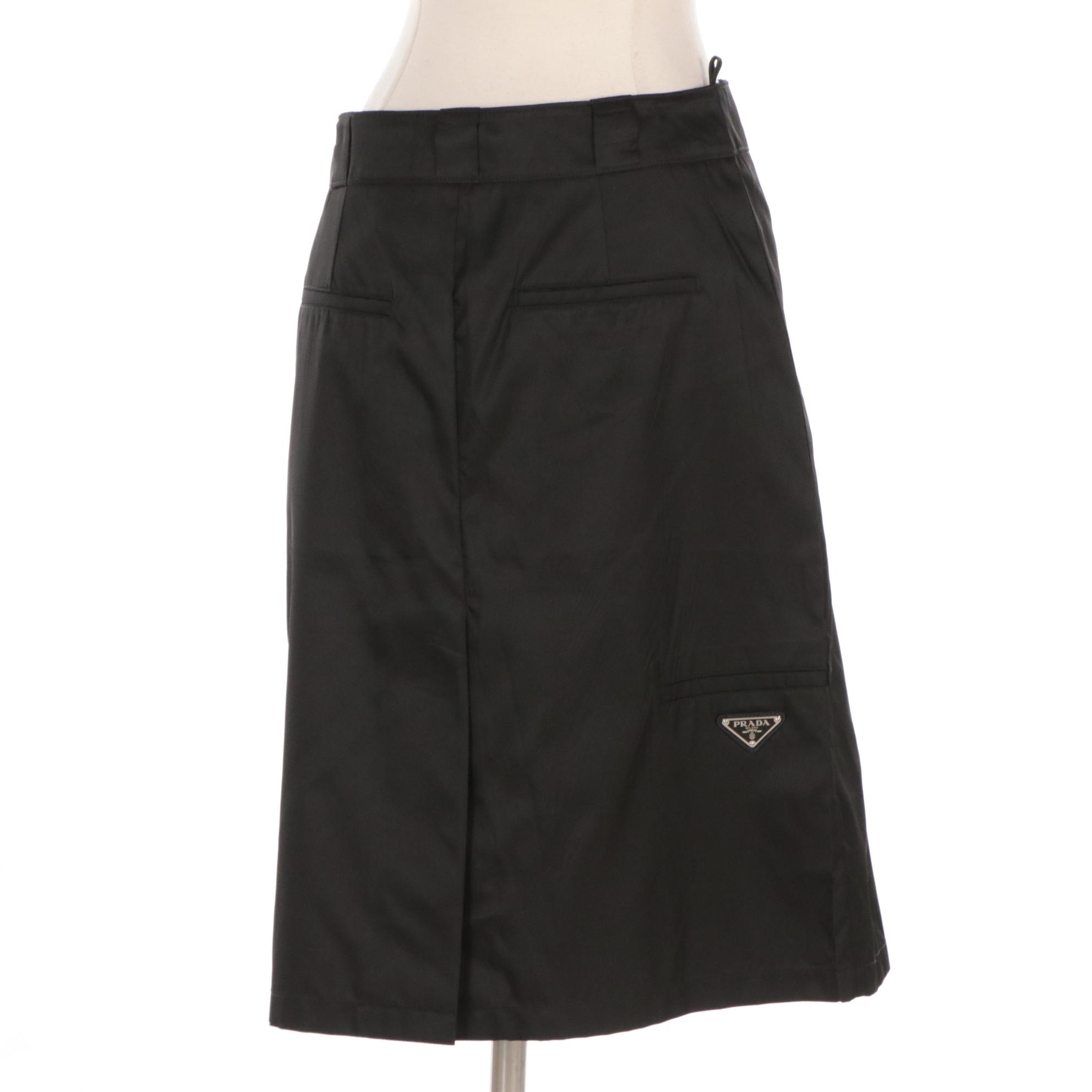 Prada Knee-Length Skirt in Black Polyamide with Enameled Logo Plaque
