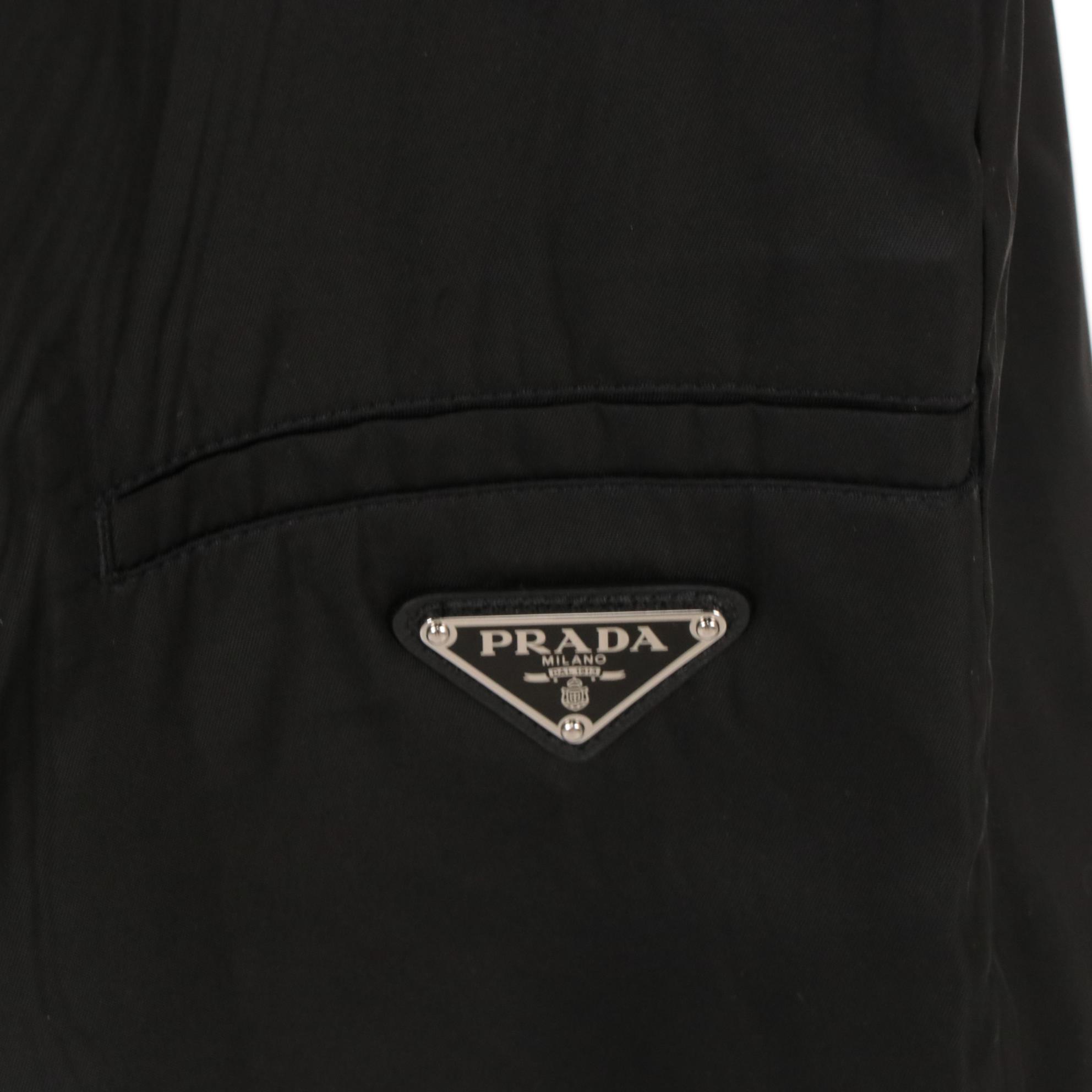 Prada Knee-Length Skirt in Black Polyamide with Enameled Logo Plaque