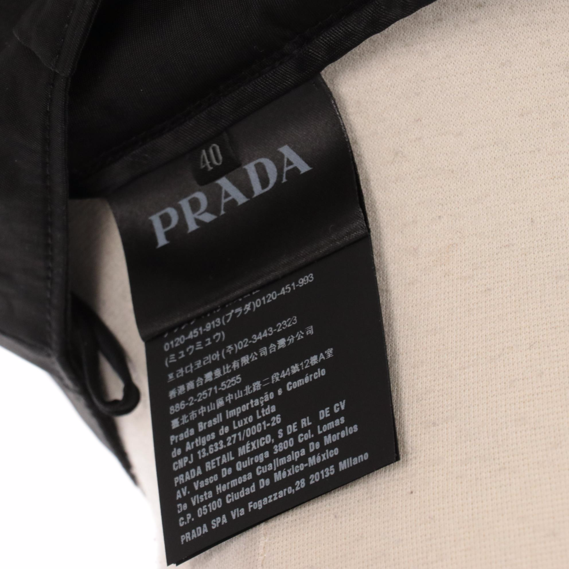 Prada Knee-Length Skirt in Black Polyamide with Enameled Logo Plaque