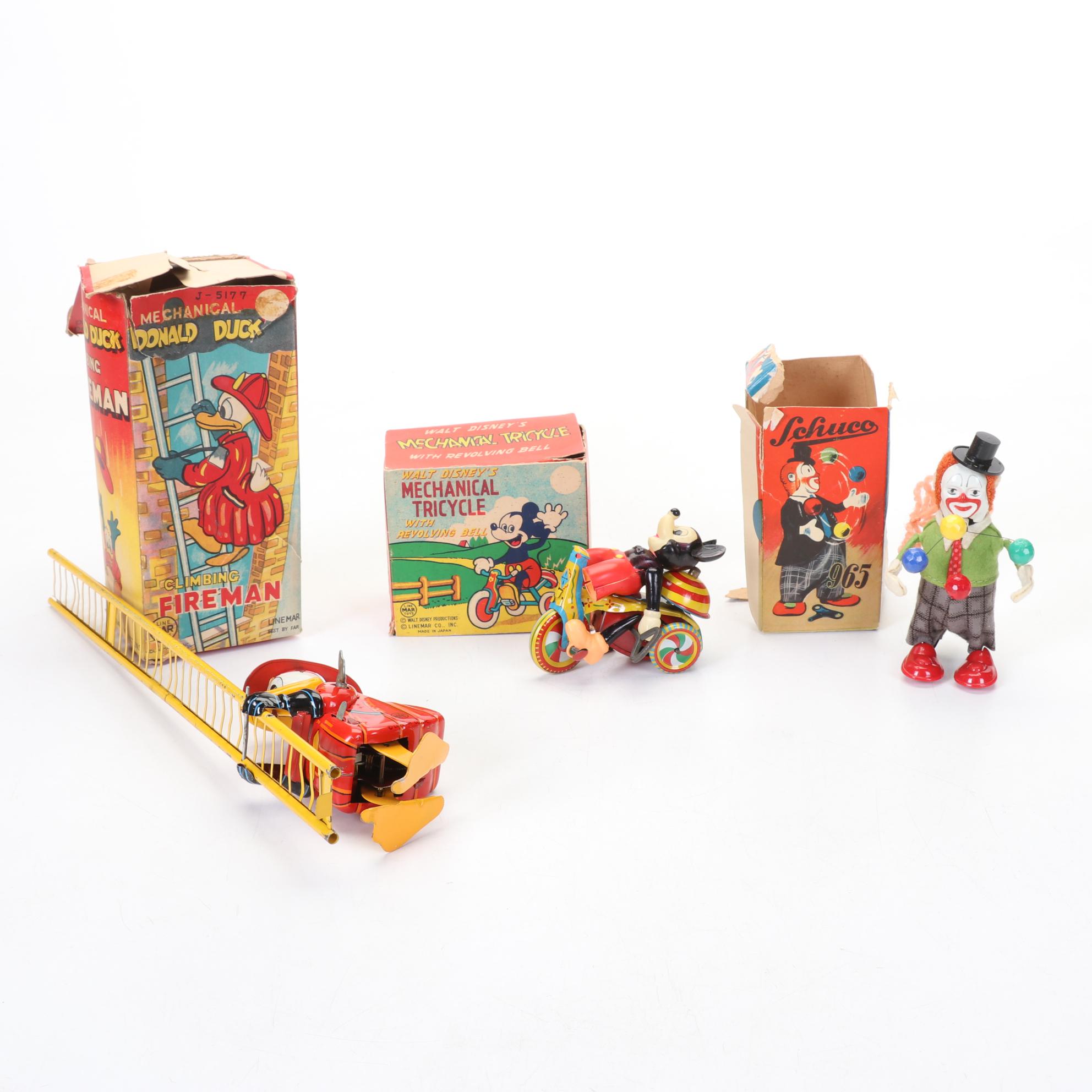 Donald Duck Climbing Fireman, Schulco Clown and Mickey Mouse Toy, 1960s