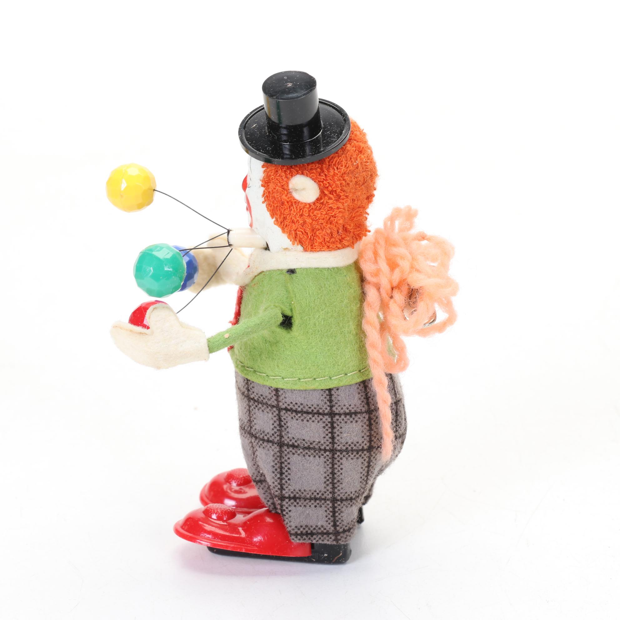 Donald Duck Climbing Fireman, Schulco Clown and Mickey Mouse Toy, 1960s