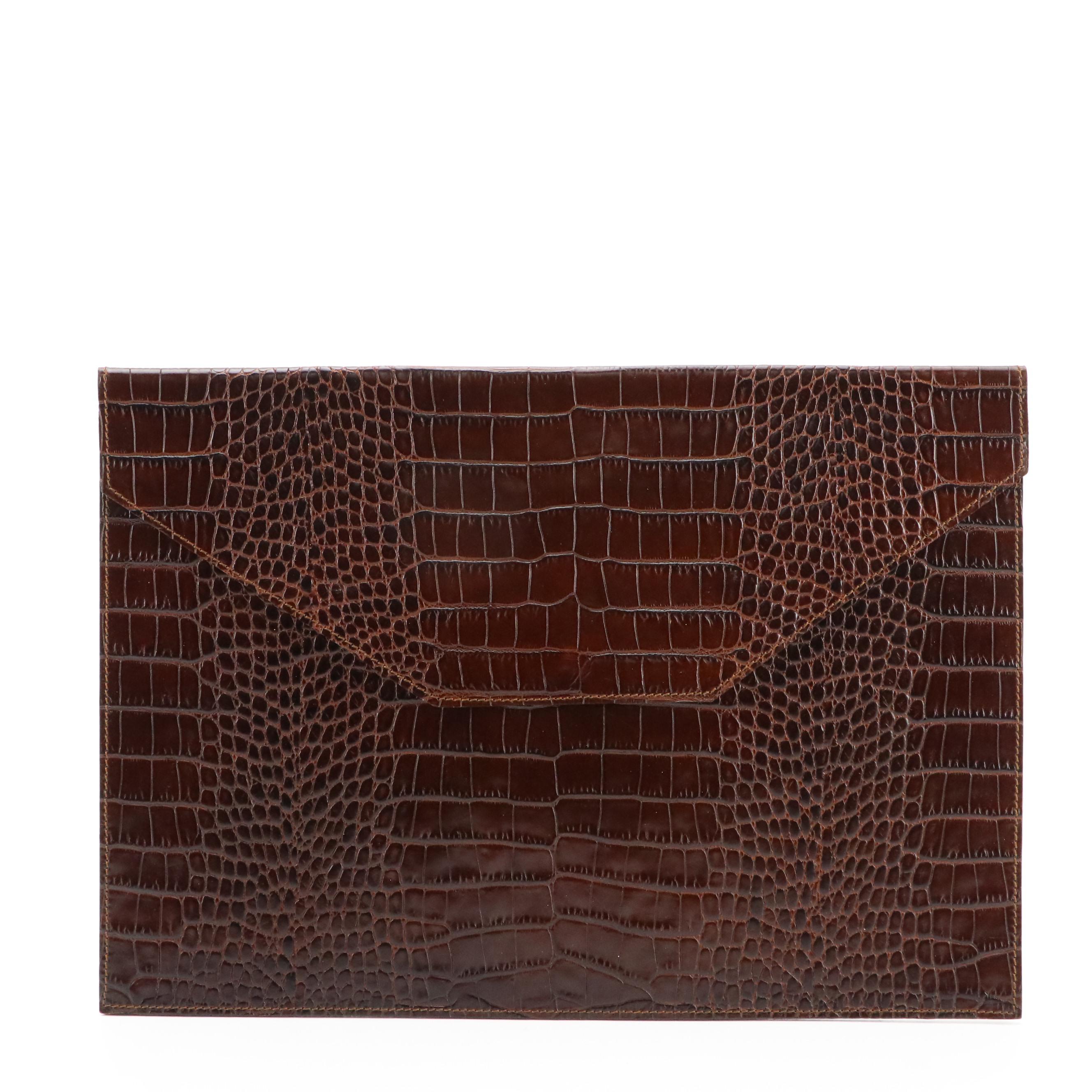 Louis Vuitton Zip Clutch, Gucci GG Supreme Barrel Pouch, Saks Embossed Folder