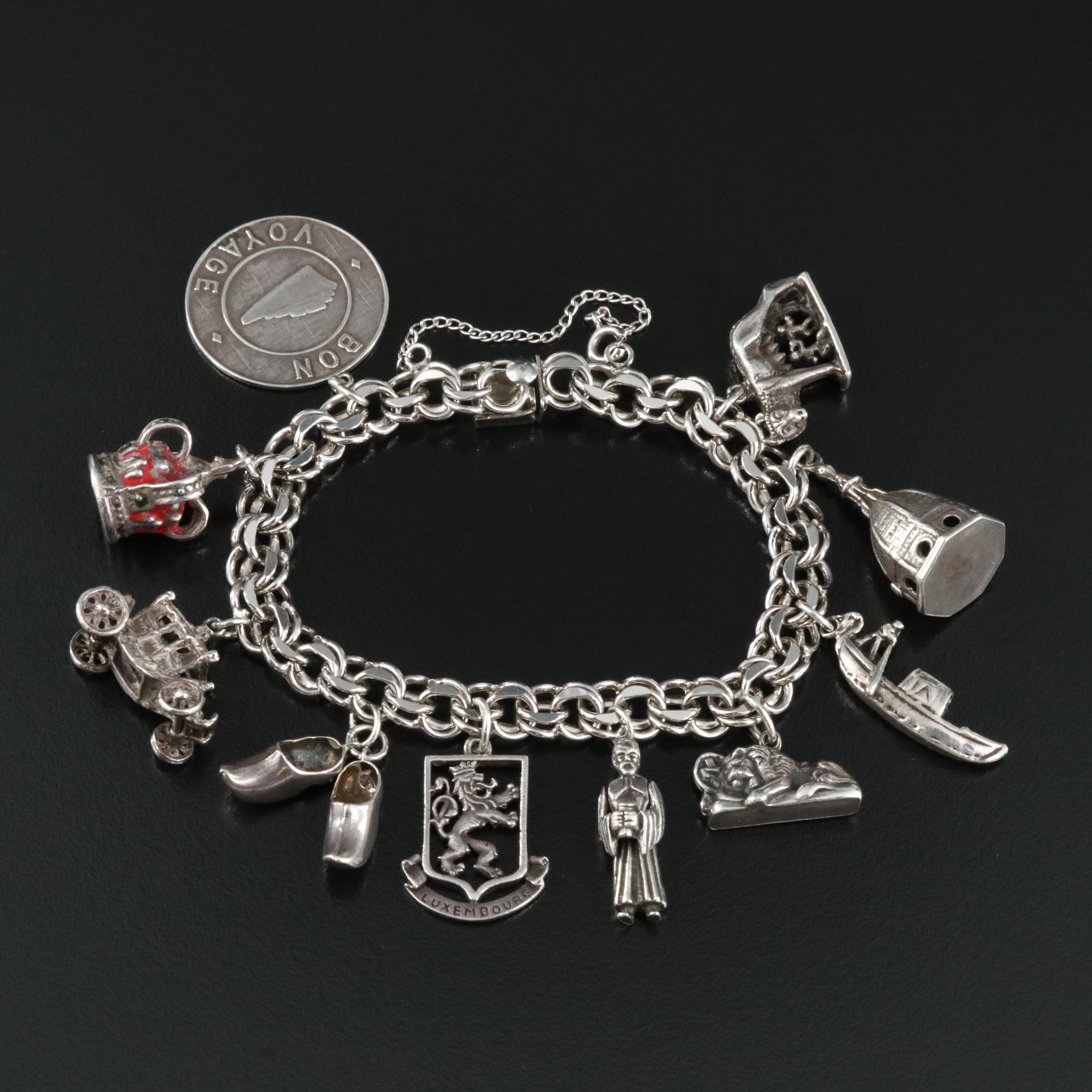 Sterling Travel Charm Bracelet Including 800 Silver and Articulated