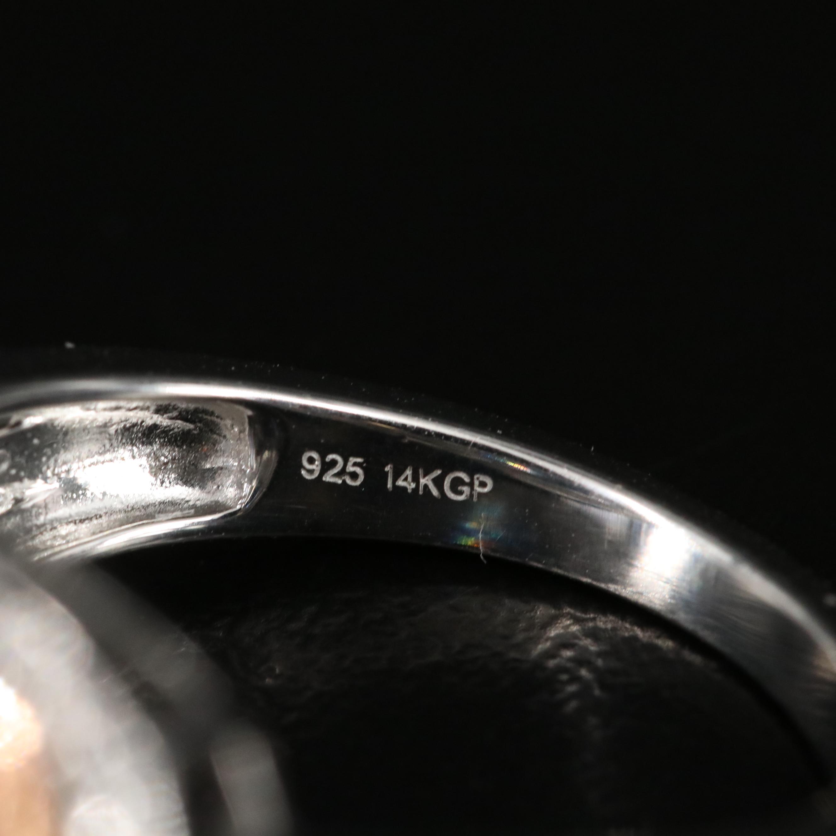 Sterling Topaz and Diamond Ring