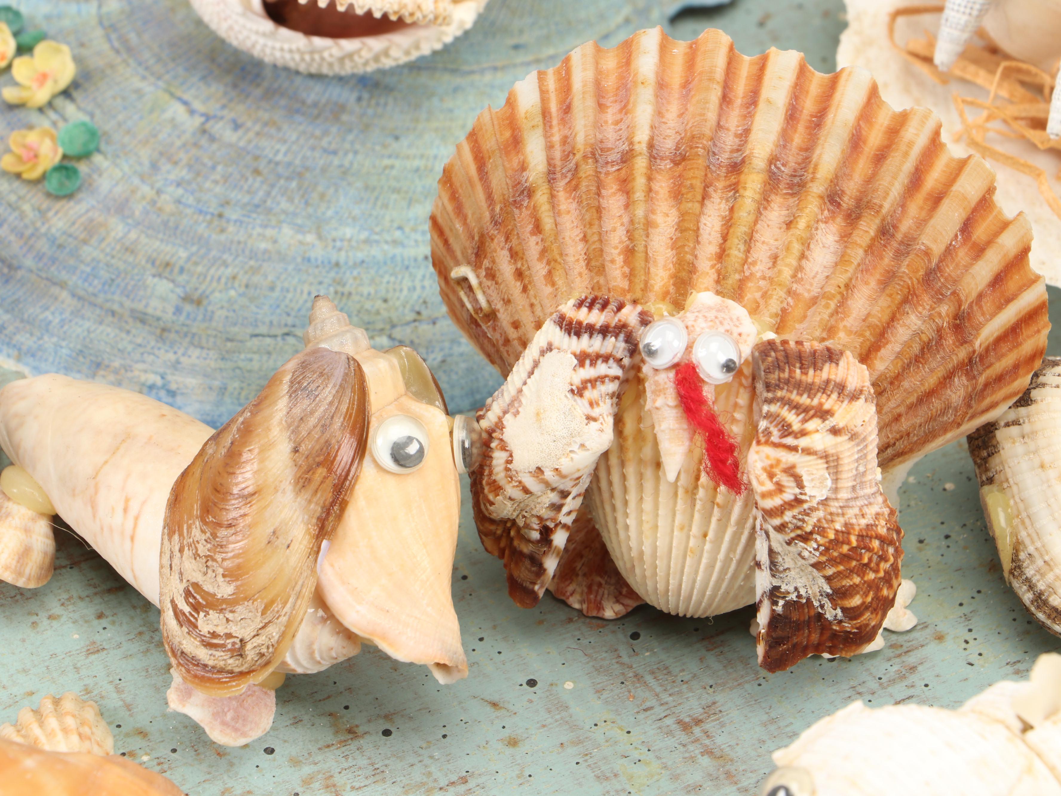 Marine Folk Art Seashell Creature Collection with Rotating Pedestal Stand
