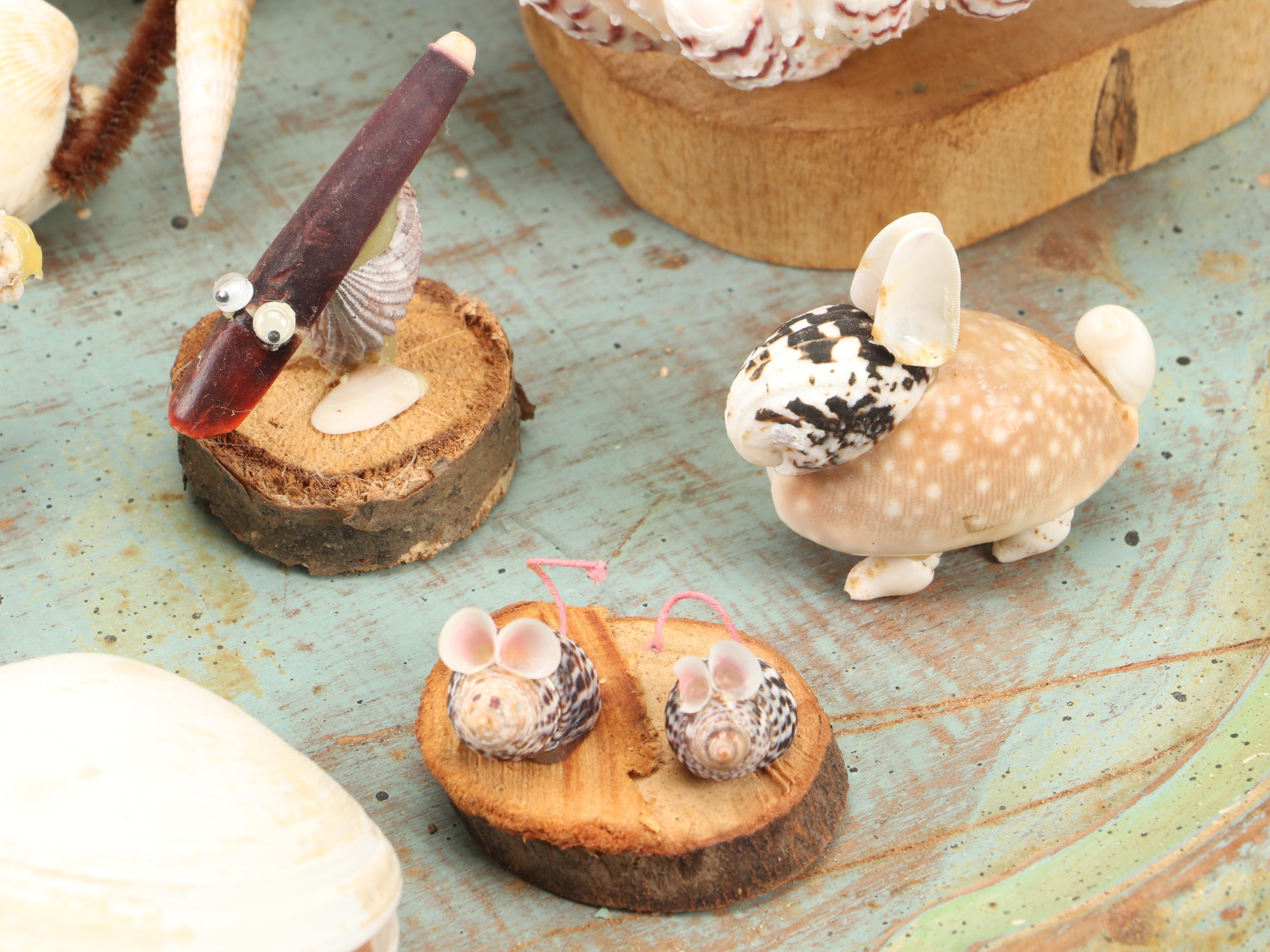 Marine Folk Art Seashell Creature Collection with Rotating Pedestal Stand