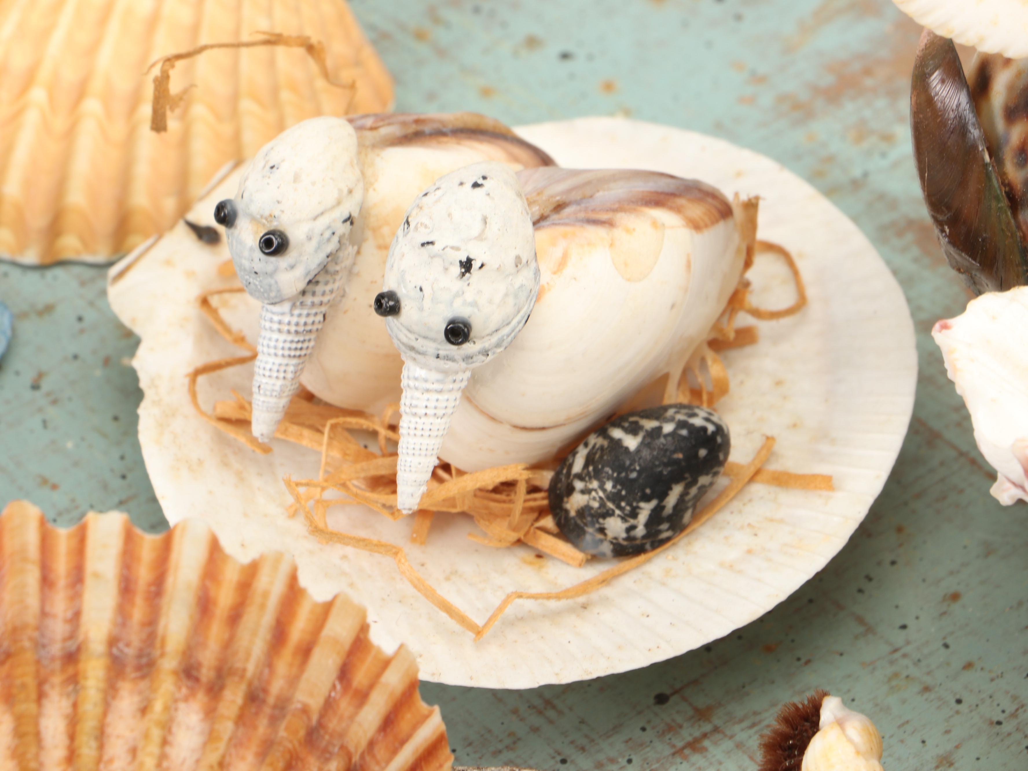 Marine Folk Art Seashell Creature Collection with Rotating Pedestal Stand