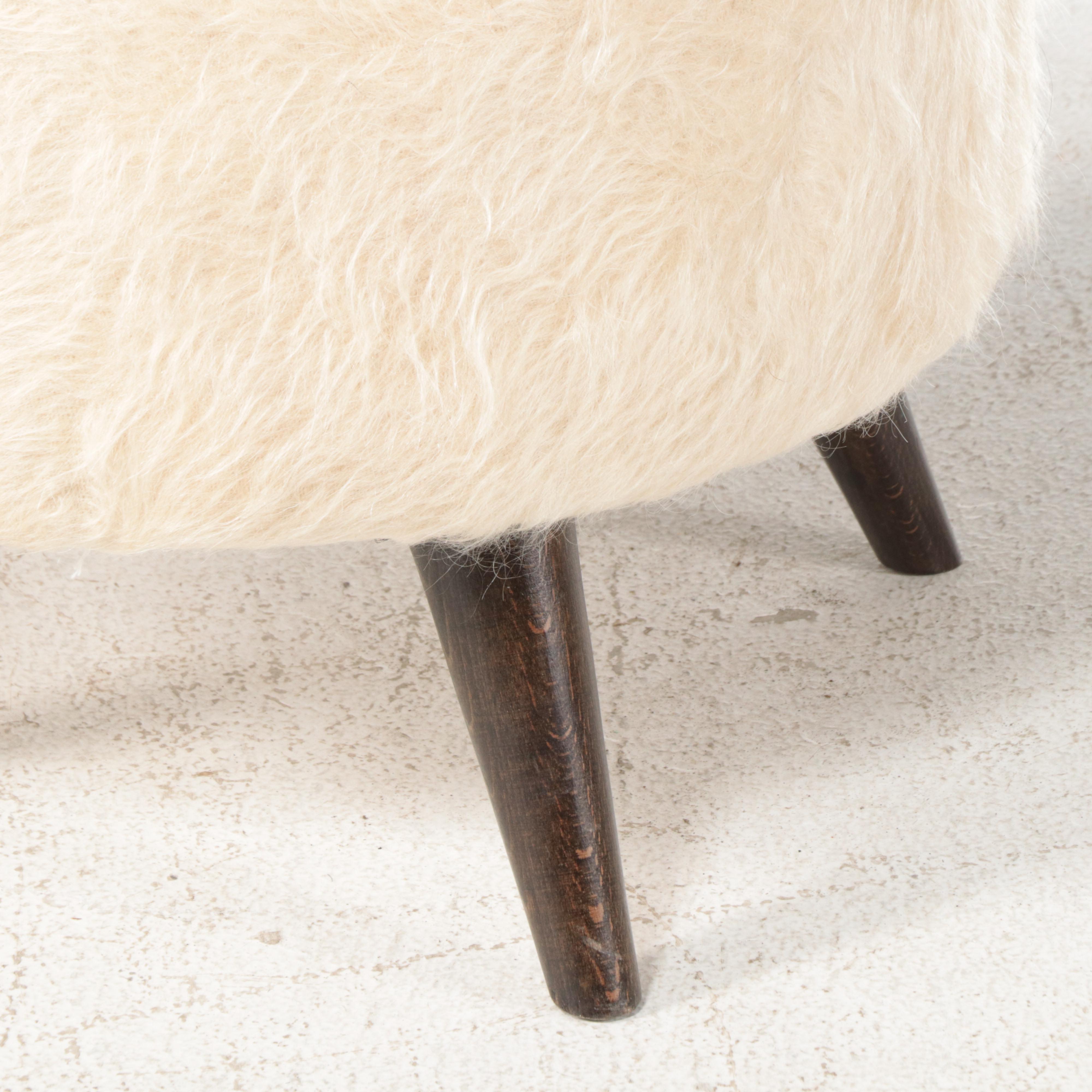 Angora Upholstered Striped Round Ottoman