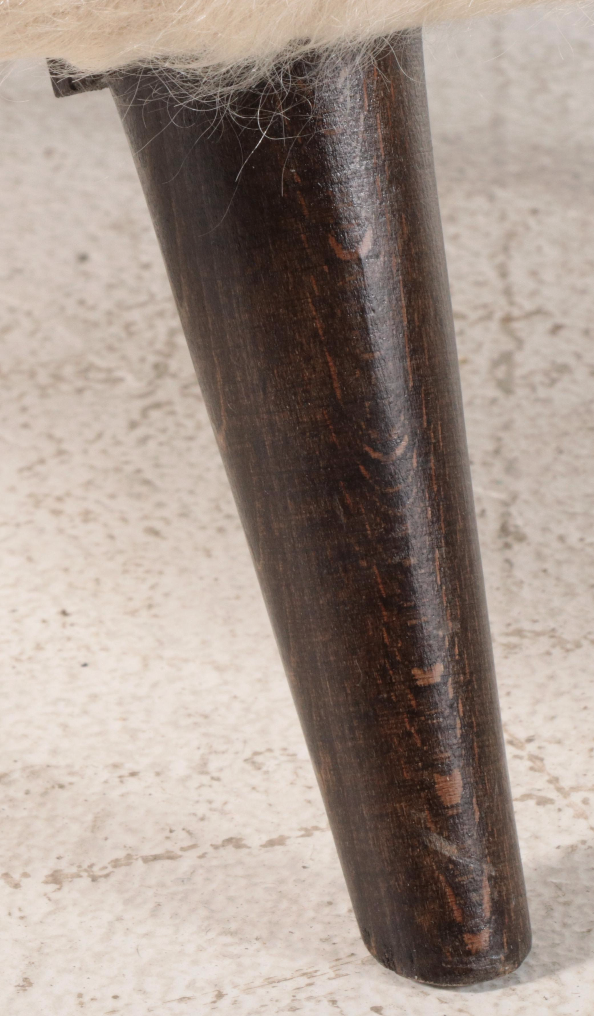 Angora Upholstered Striped Round Ottoman