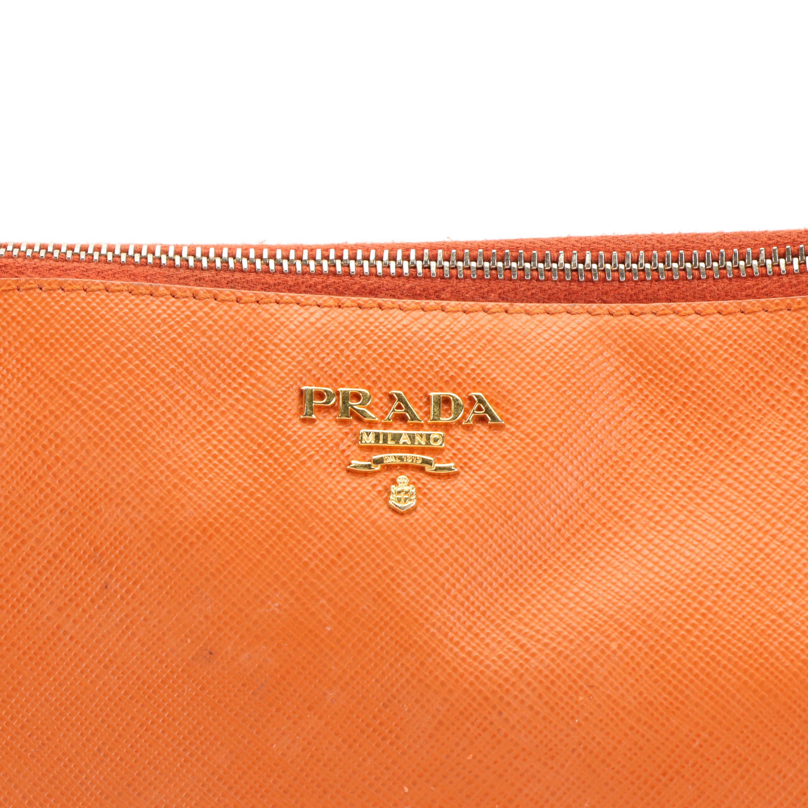 Prada Clutch in Orange Saffiano Leather