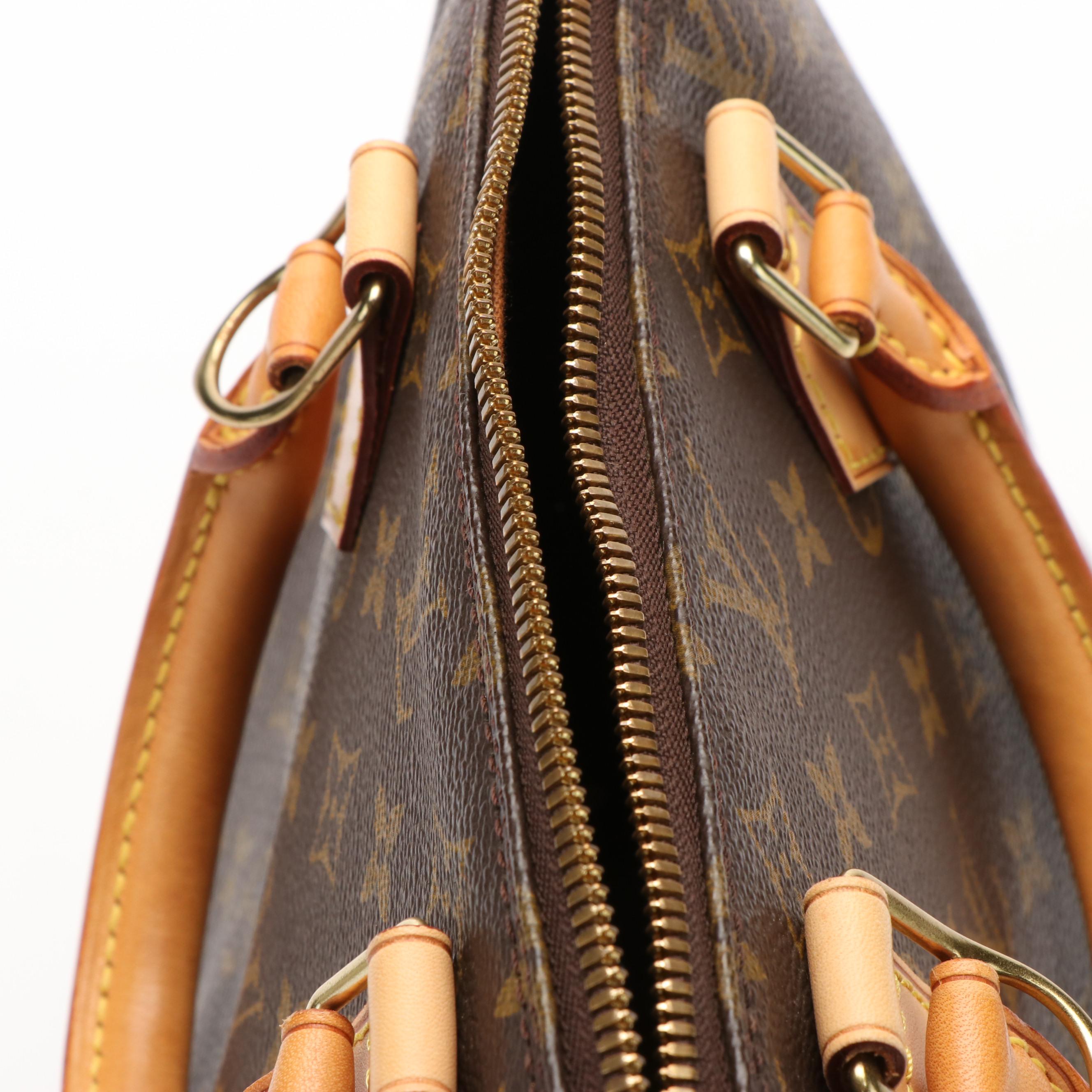 Louis Vuitton Alma Monogram Canvas Handbag