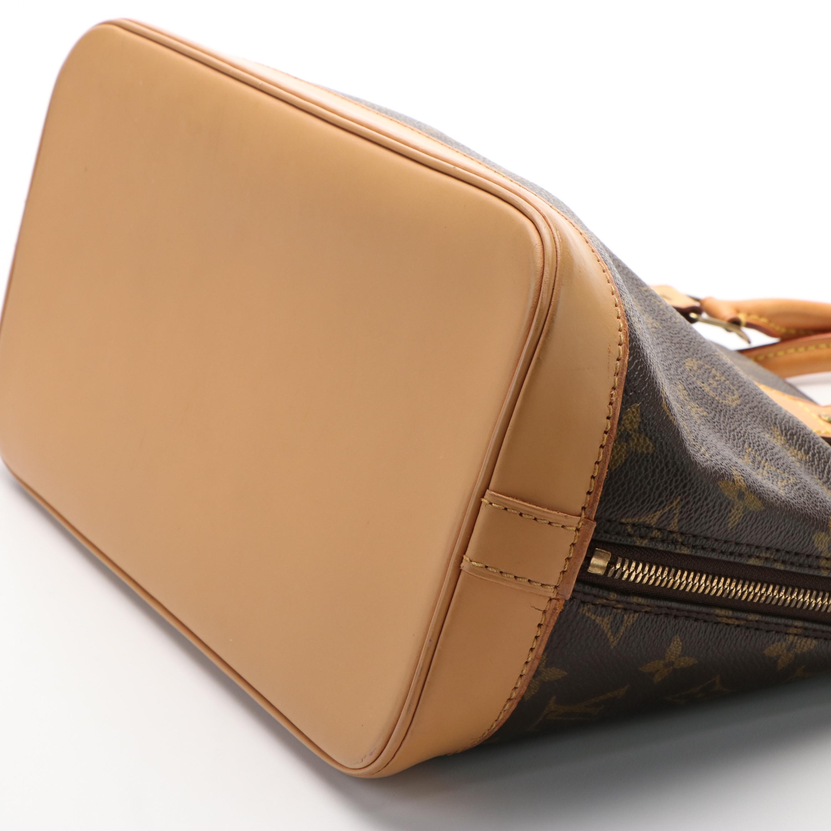 Louis Vuitton Alma Monogram Canvas Handbag
