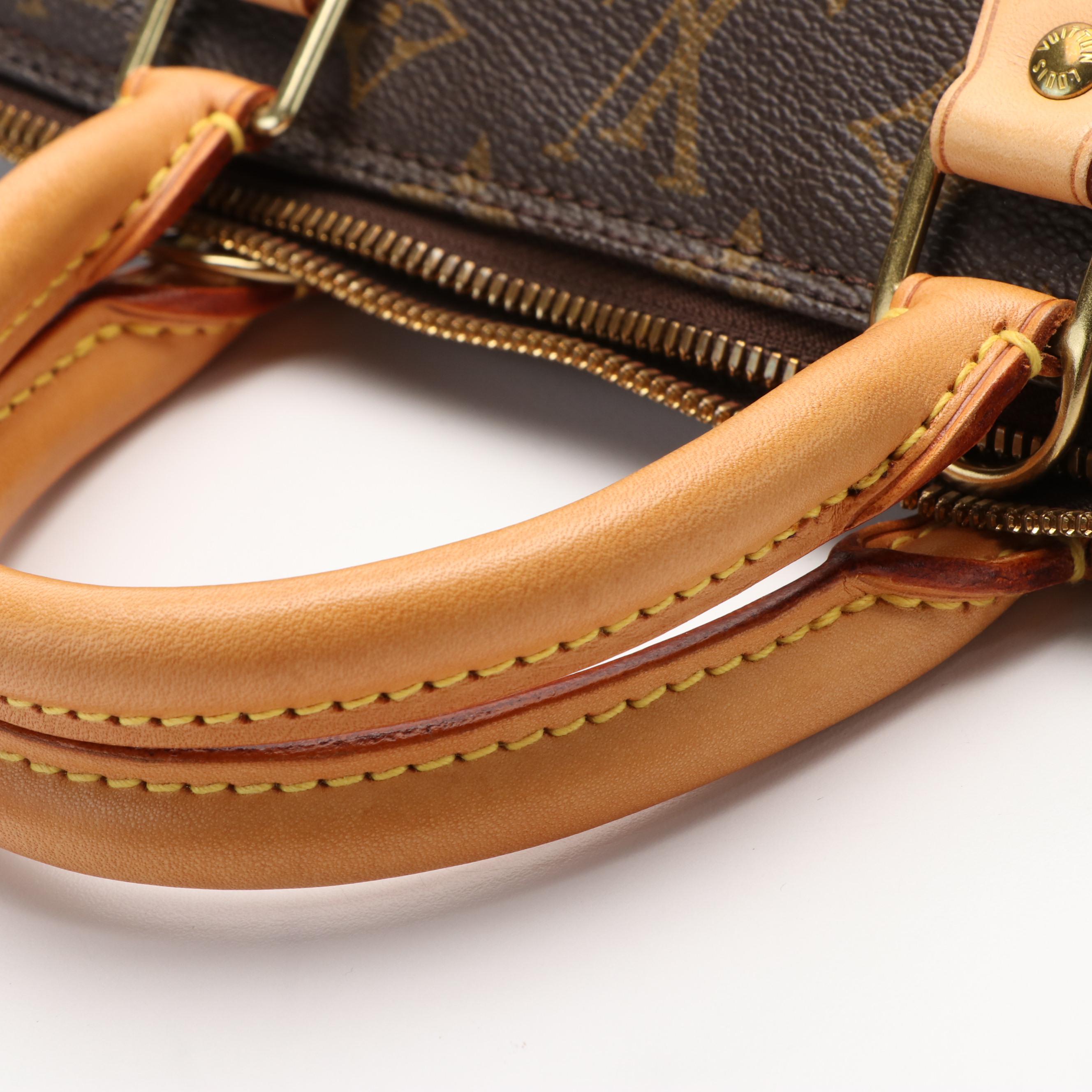 Louis Vuitton Alma Monogram Canvas Handbag