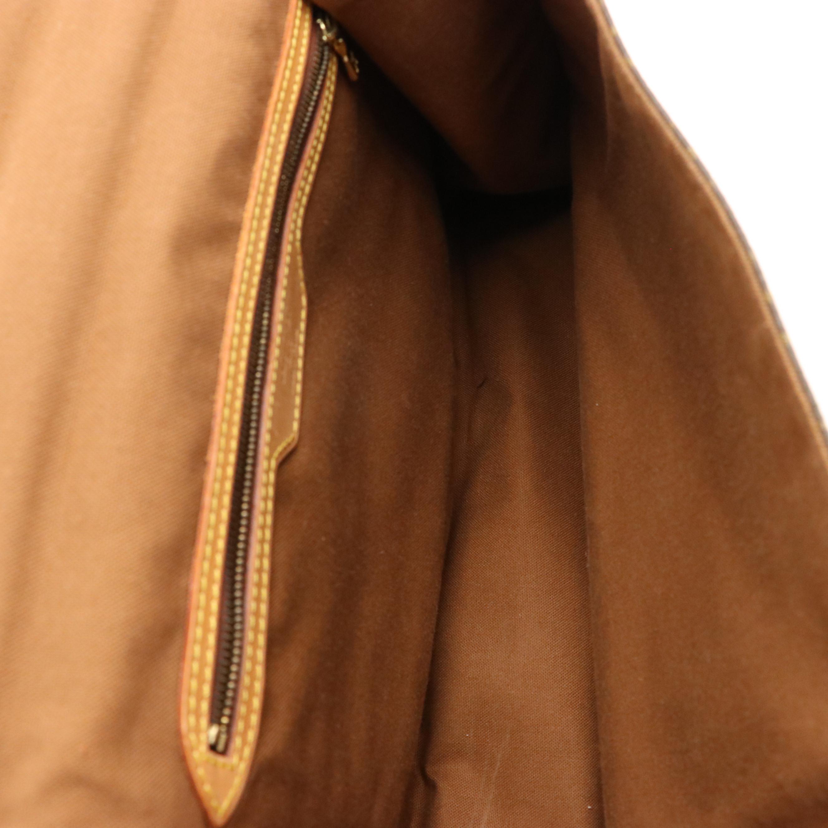 Louis Vuitton Saumar 40 in Monogram Canvas and Vachetta Leather