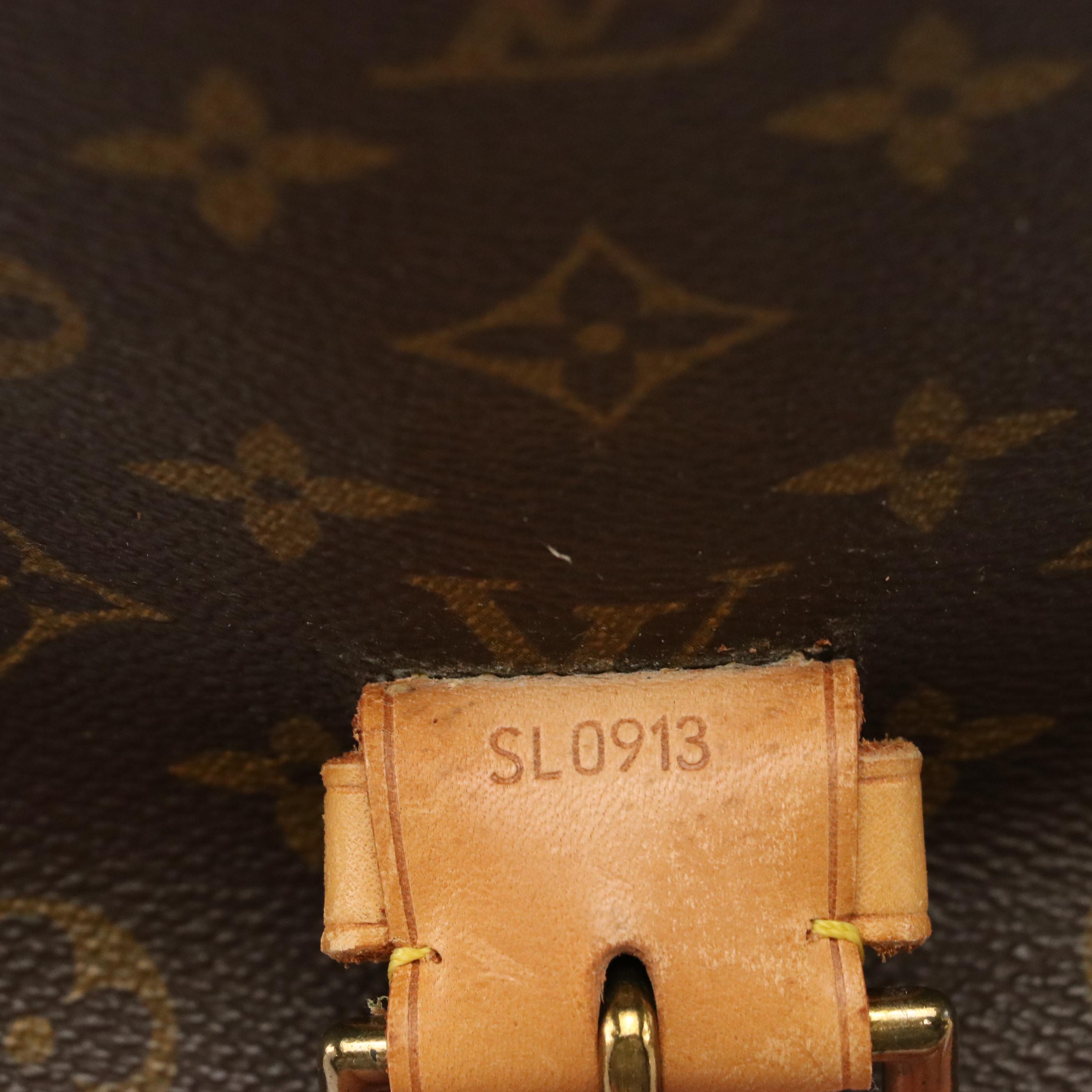 Louis Vuitton Saumar 40 in Monogram Canvas and Vachetta Leather