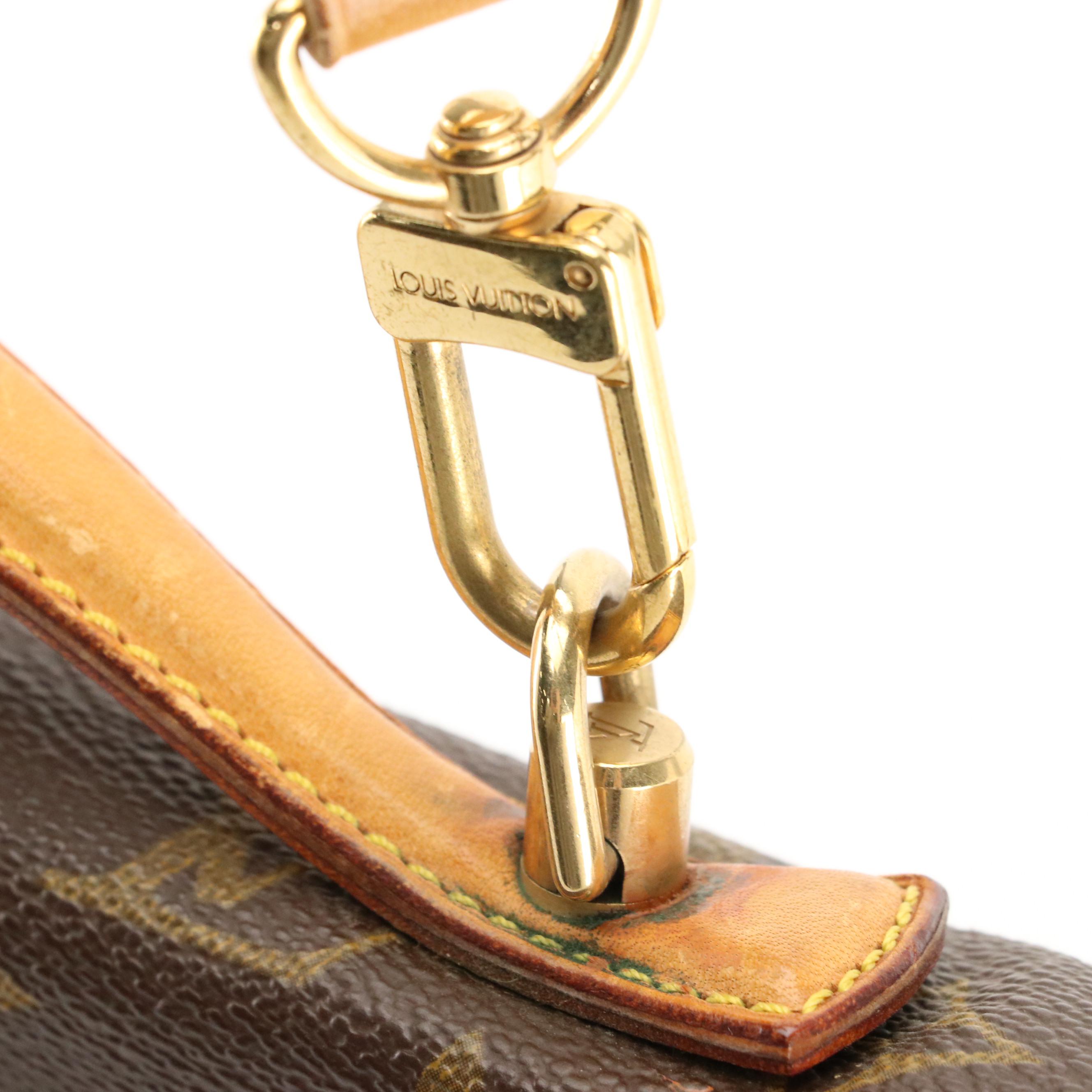 Louis Vuitton Saumar 40 in Monogram Canvas and Vachetta Leather