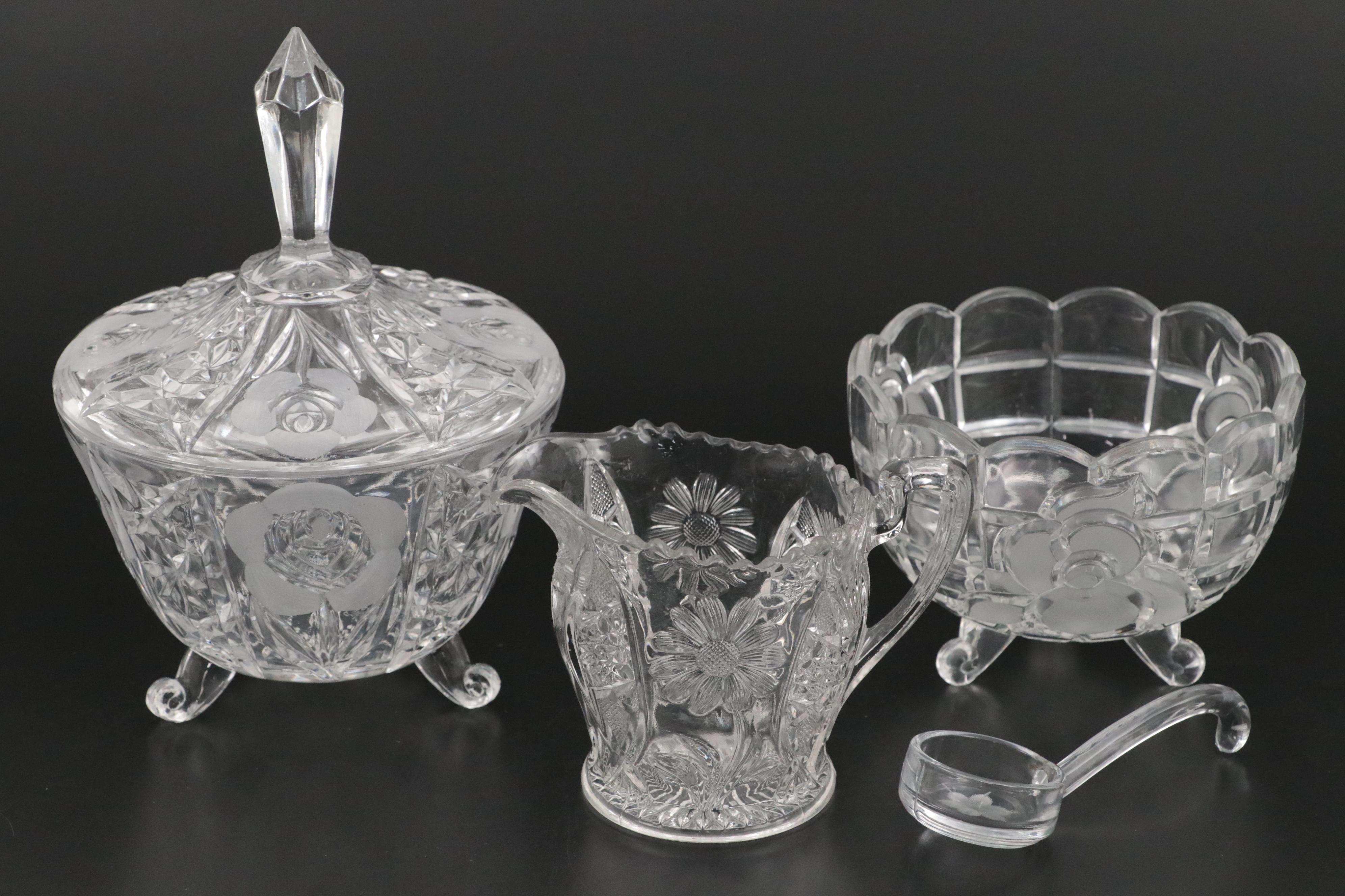 Floral Motif Wheel Engraved Candy Jar and Candlesticks with More Glass Décor