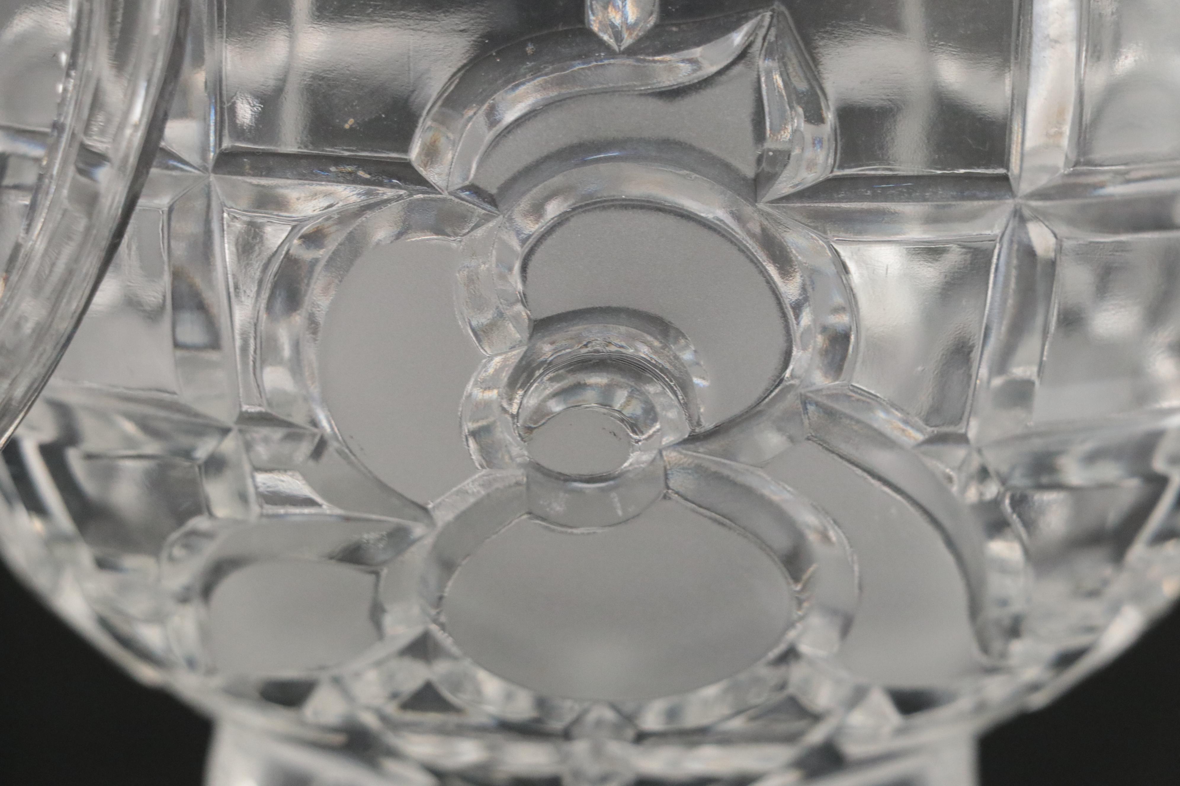 Floral Motif Wheel Engraved Candy Jar and Candlesticks with More Glass Décor