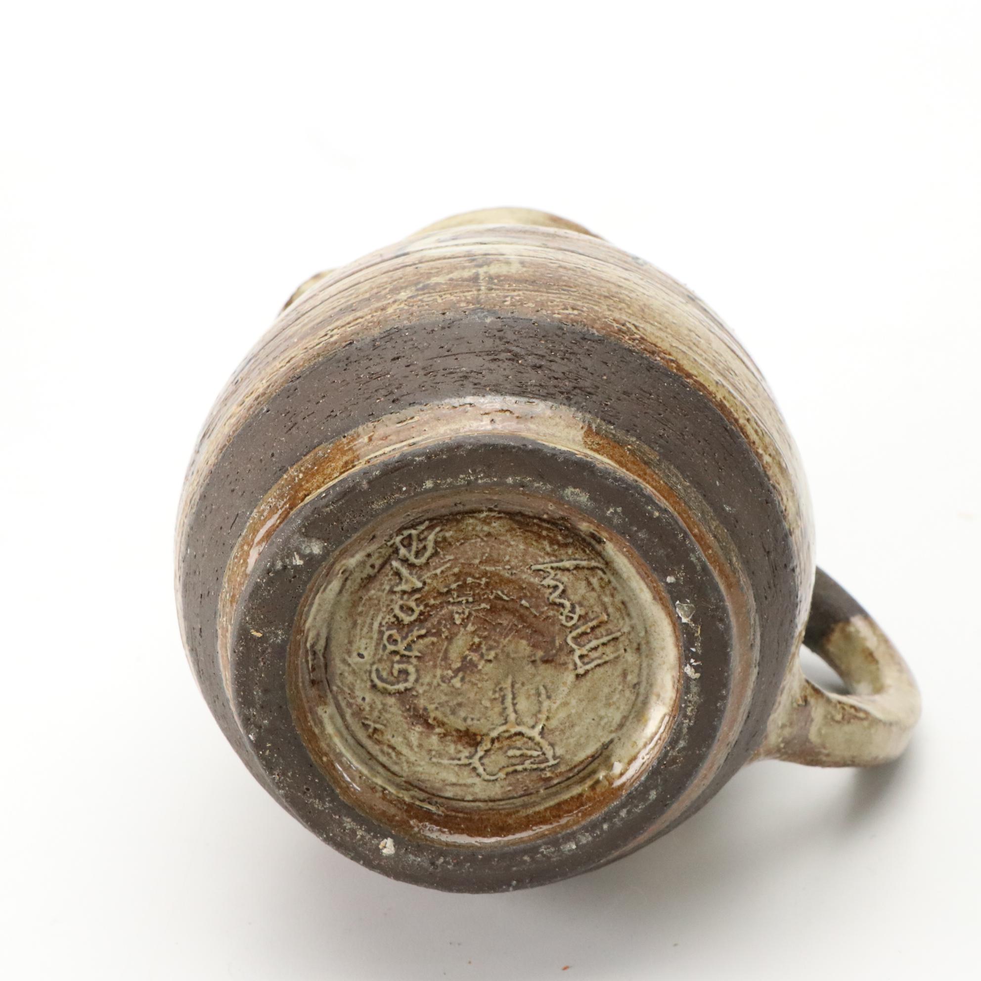 Bottle Shaped Music Box with Owl Shaped and Other Art Pottery Pitchers