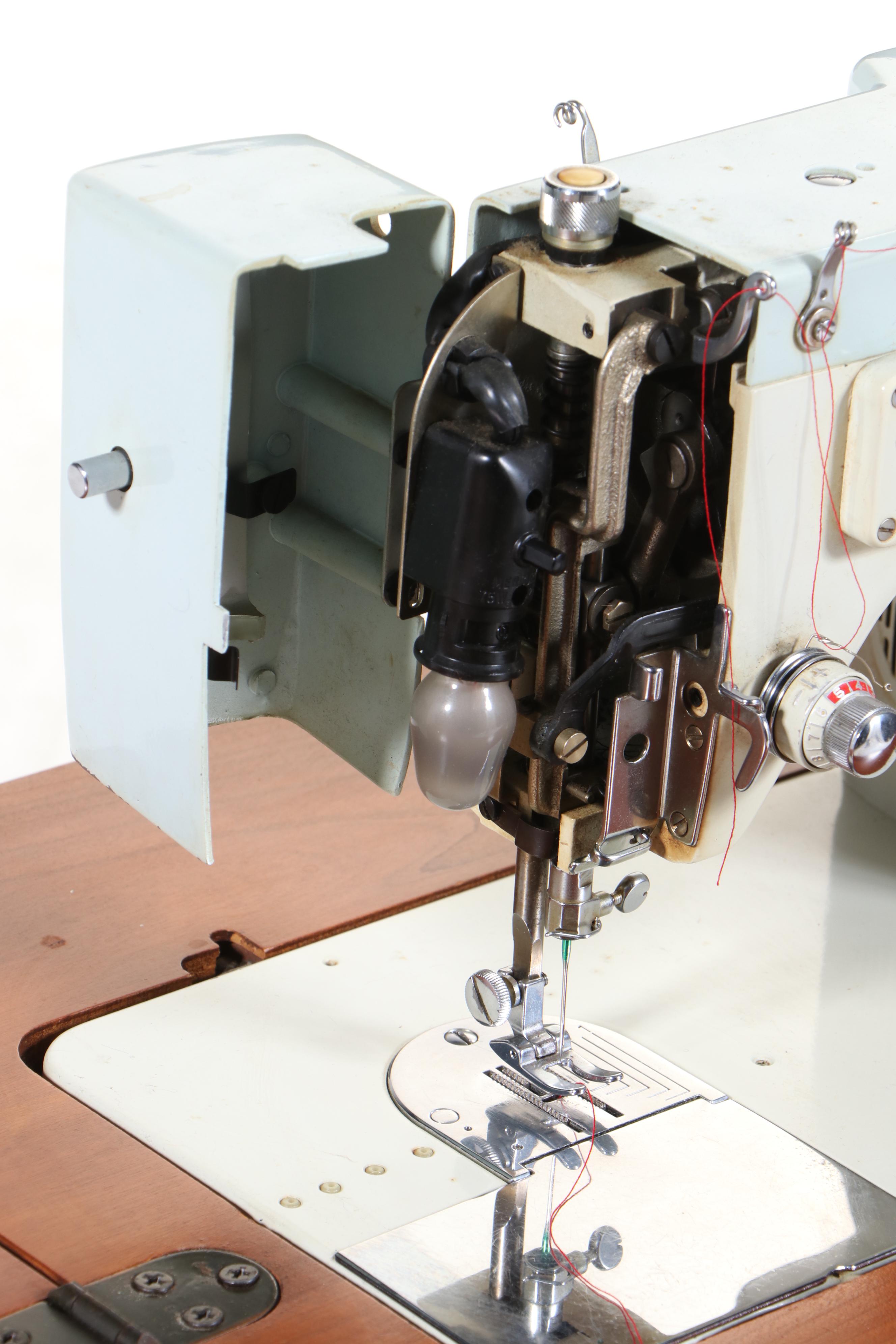 White Model 578 Sewing Machine with Wood Cabinet, Mid-20th Century