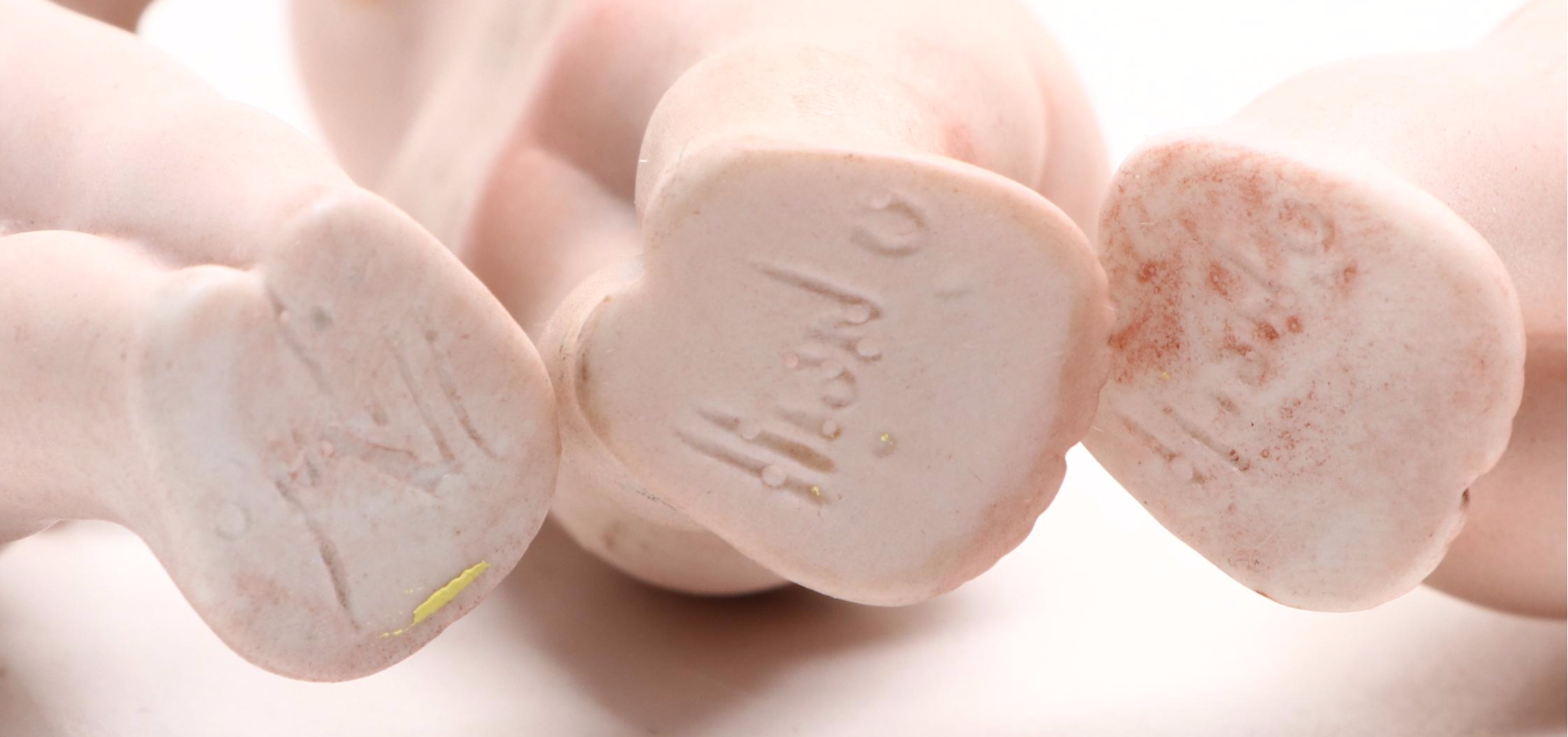 Rose O'Neill Bisque Porcelain Kewpie Doll Figurines with Jointed Arms