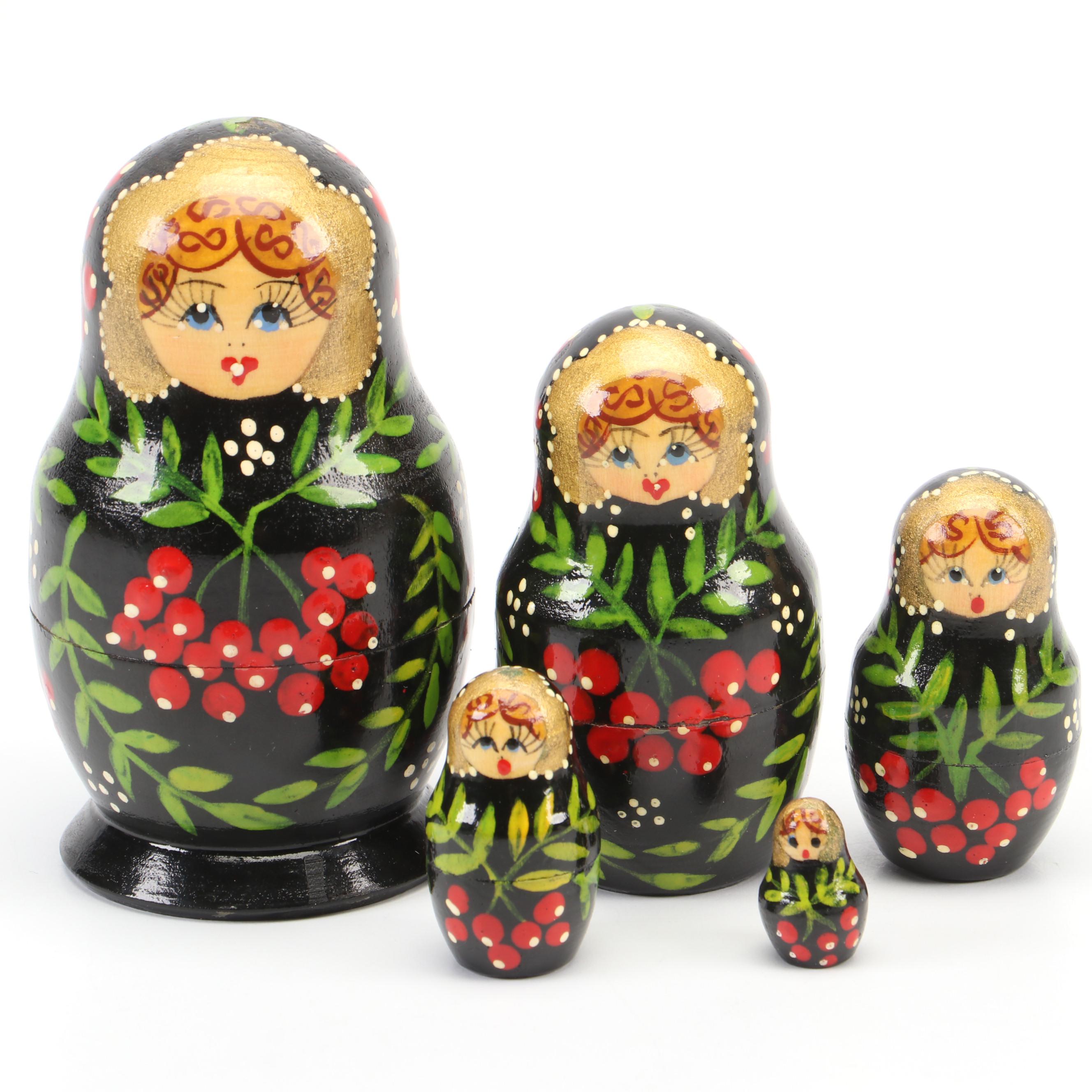 Hand-Painted Gilt Wood Matryoshka Dolls