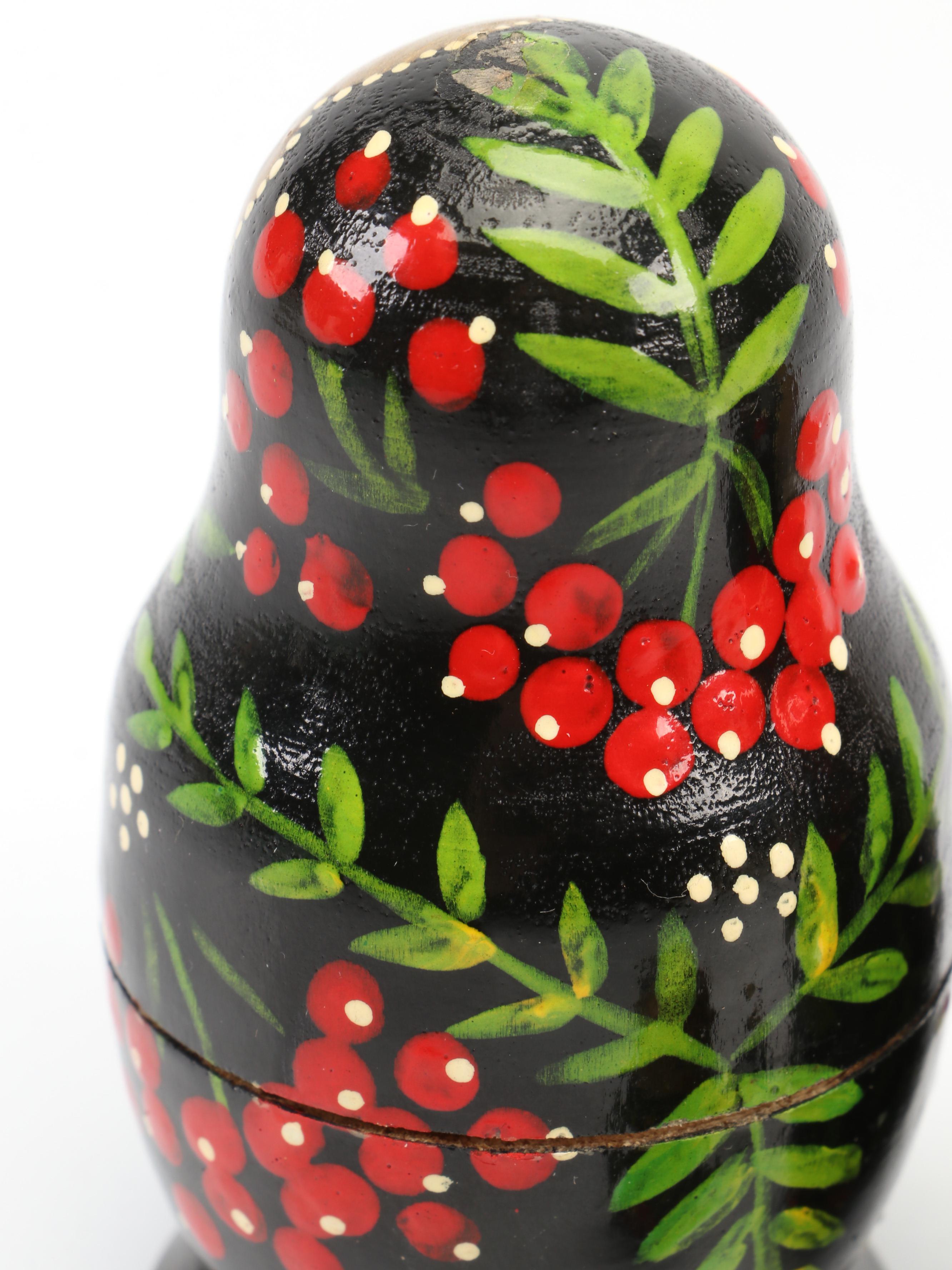 Hand-Painted Gilt Wood Matryoshka Dolls