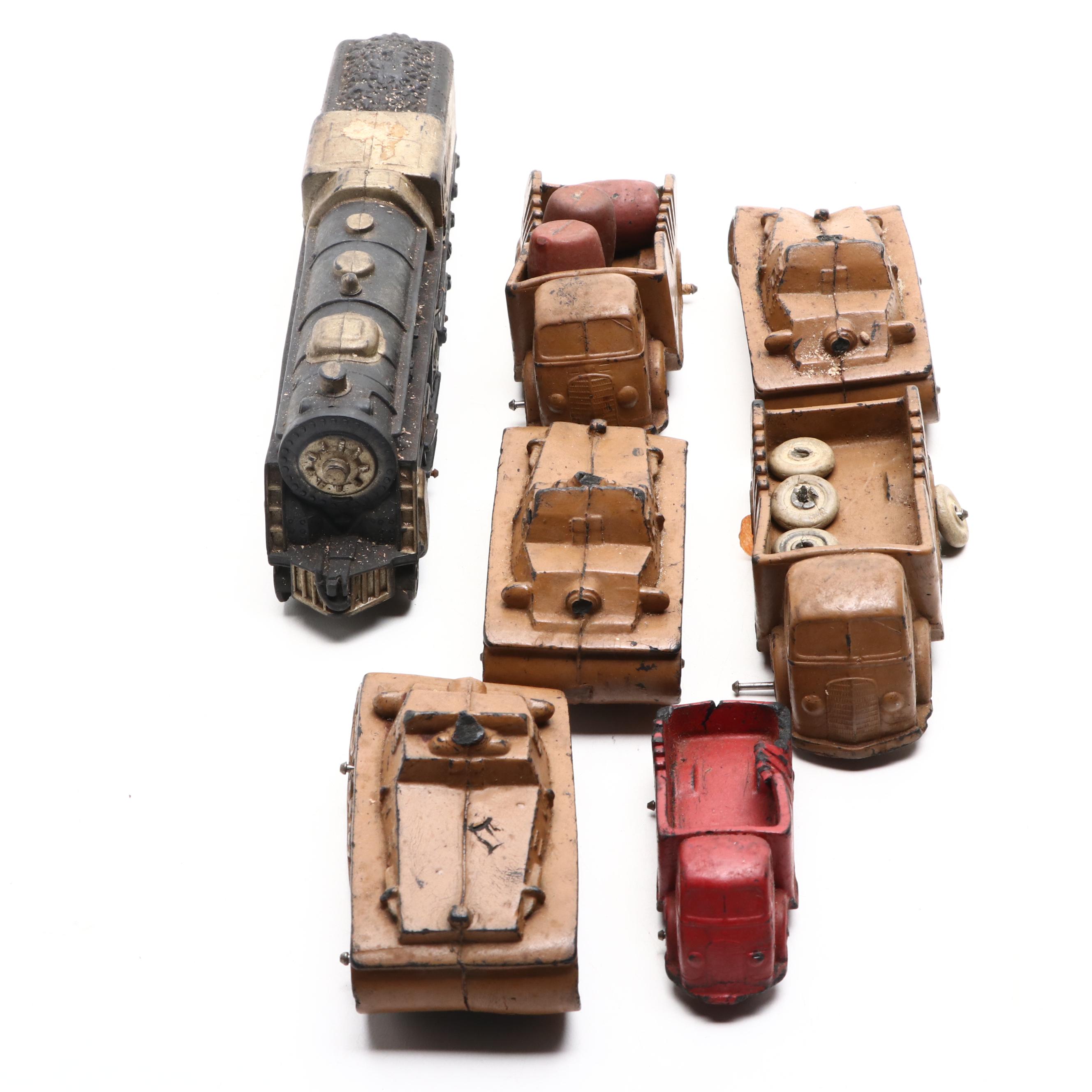 Auburn Rubber Company Toy Tanks, Locomotive and Trucks, Mid-20th Century