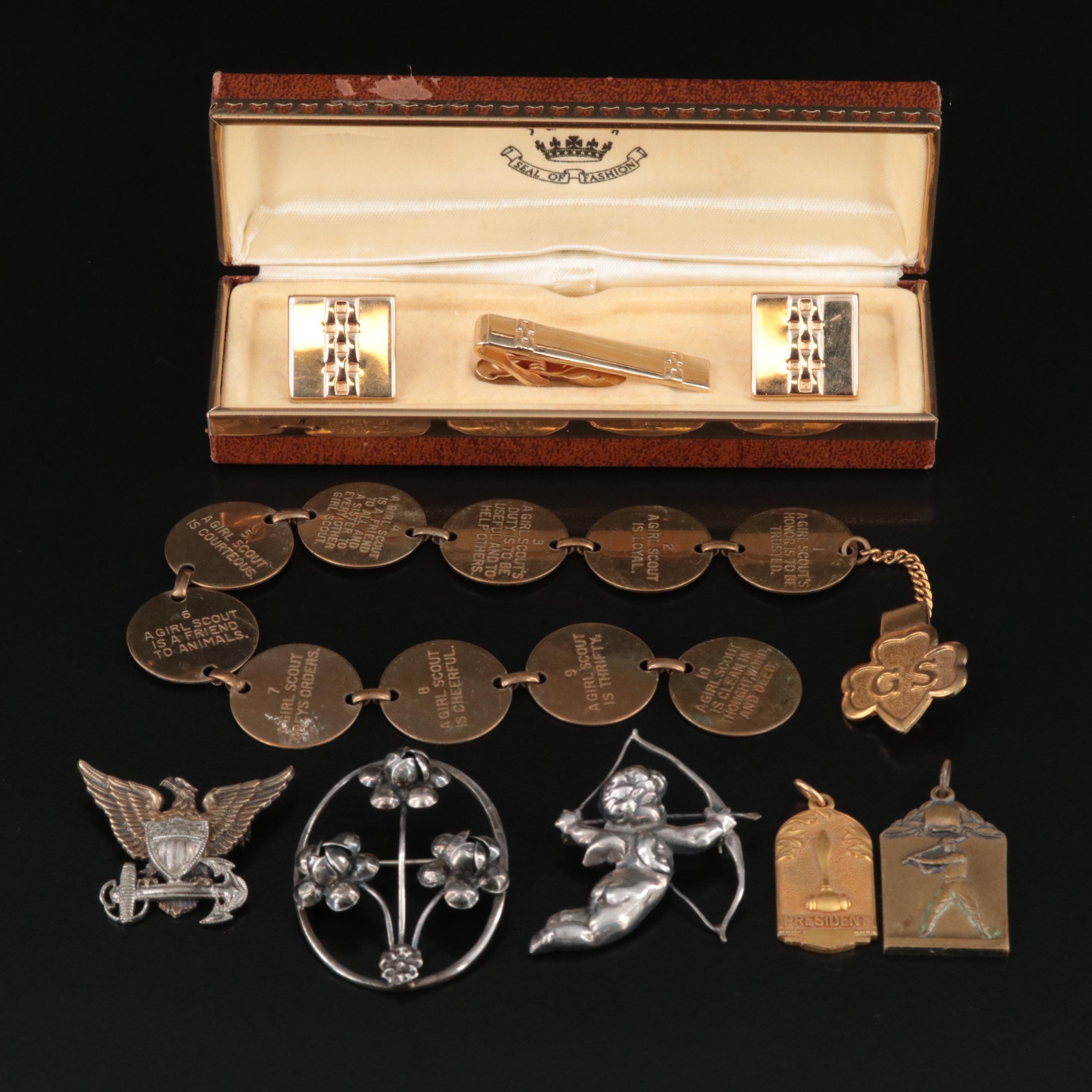 Sterling Cupid Brooch and US Navy Pin Featured in Vintage Jewelry