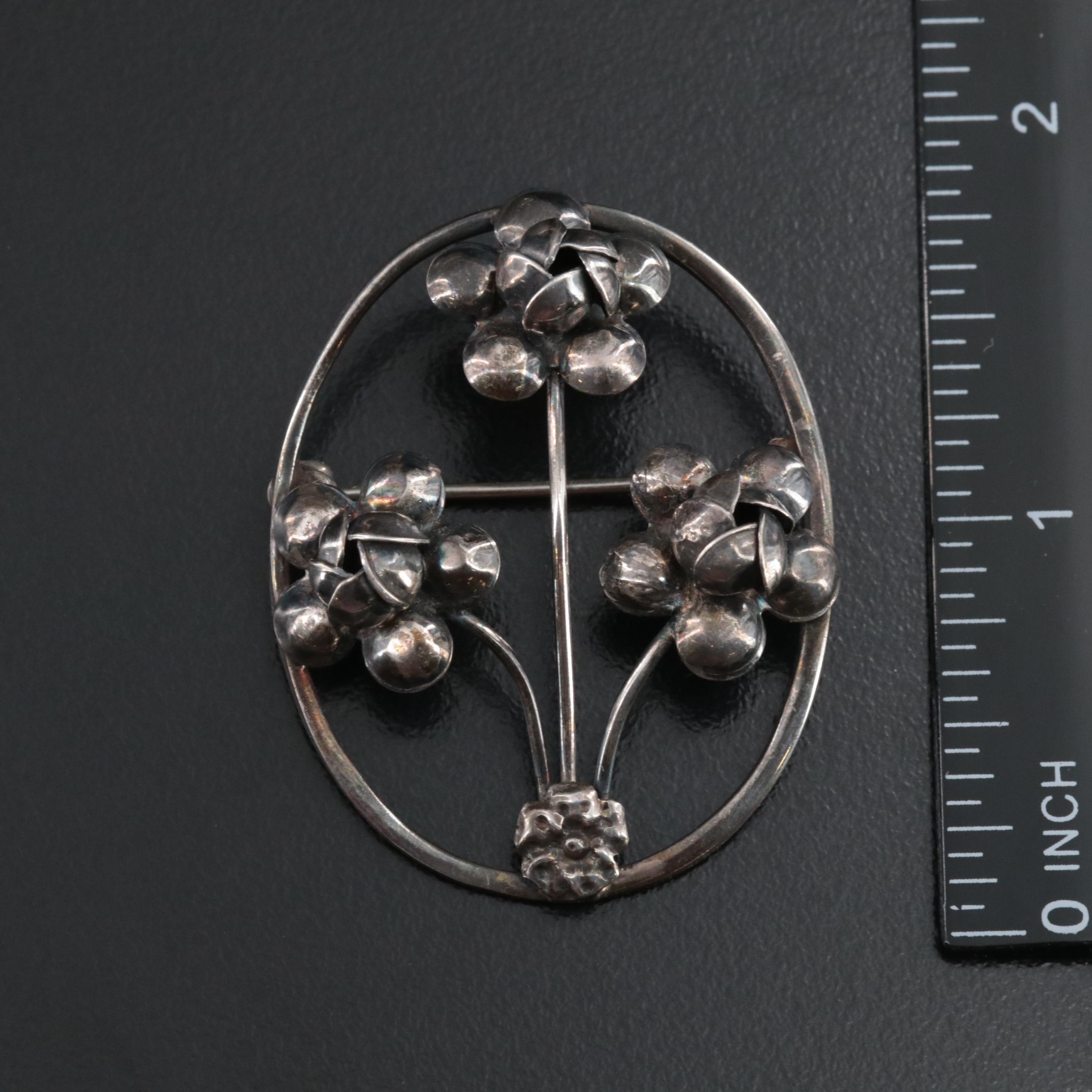 Sterling Cupid Brooch and US Navy Pin Featured in Vintage Jewelry